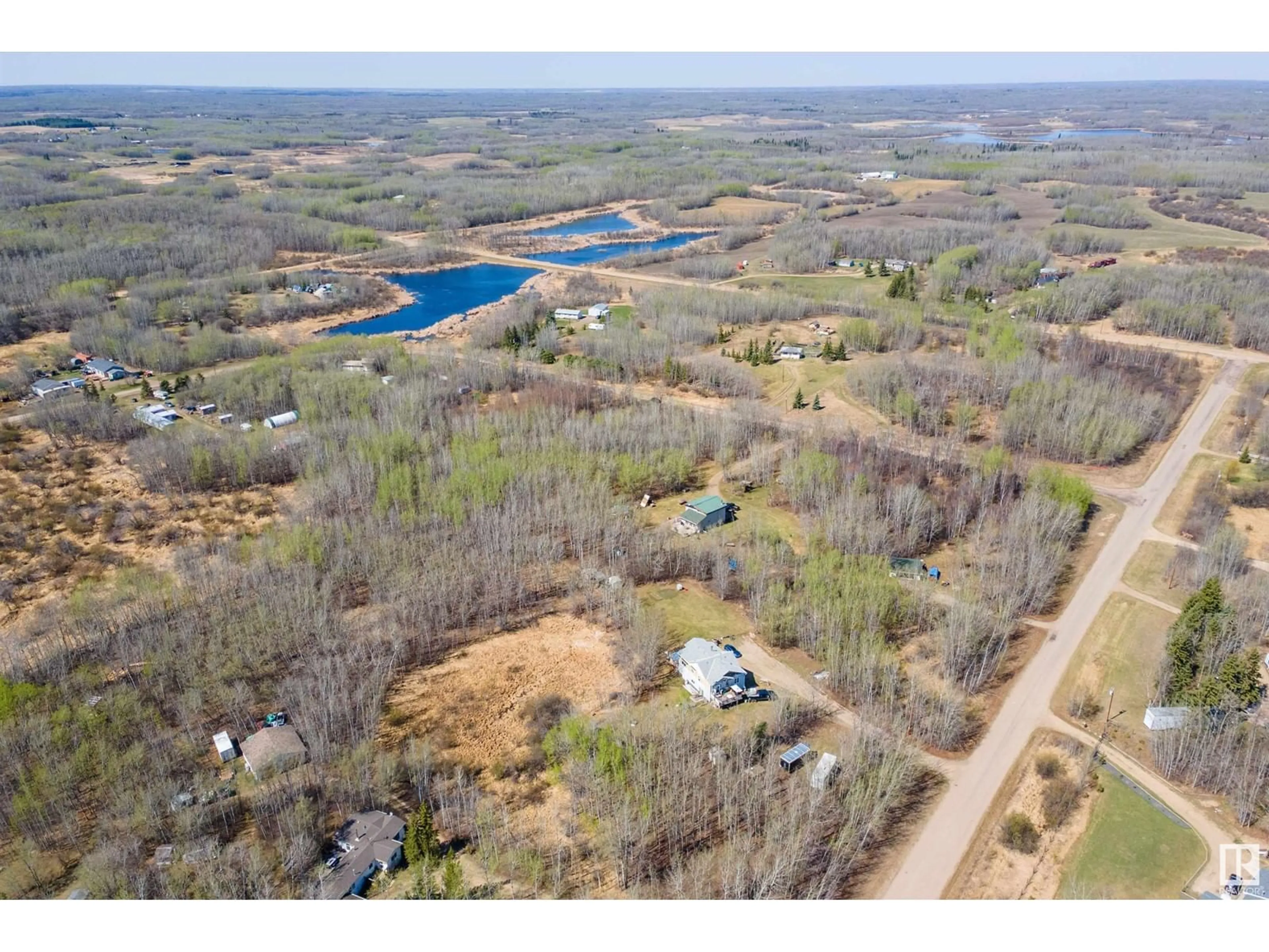 A pic from outside/outdoor area/front of a property/back of a property/a pic from drone, water/lake/river/ocean view for 50121 - 24 RR 204, Rural Beaver County Alberta T0B4J2