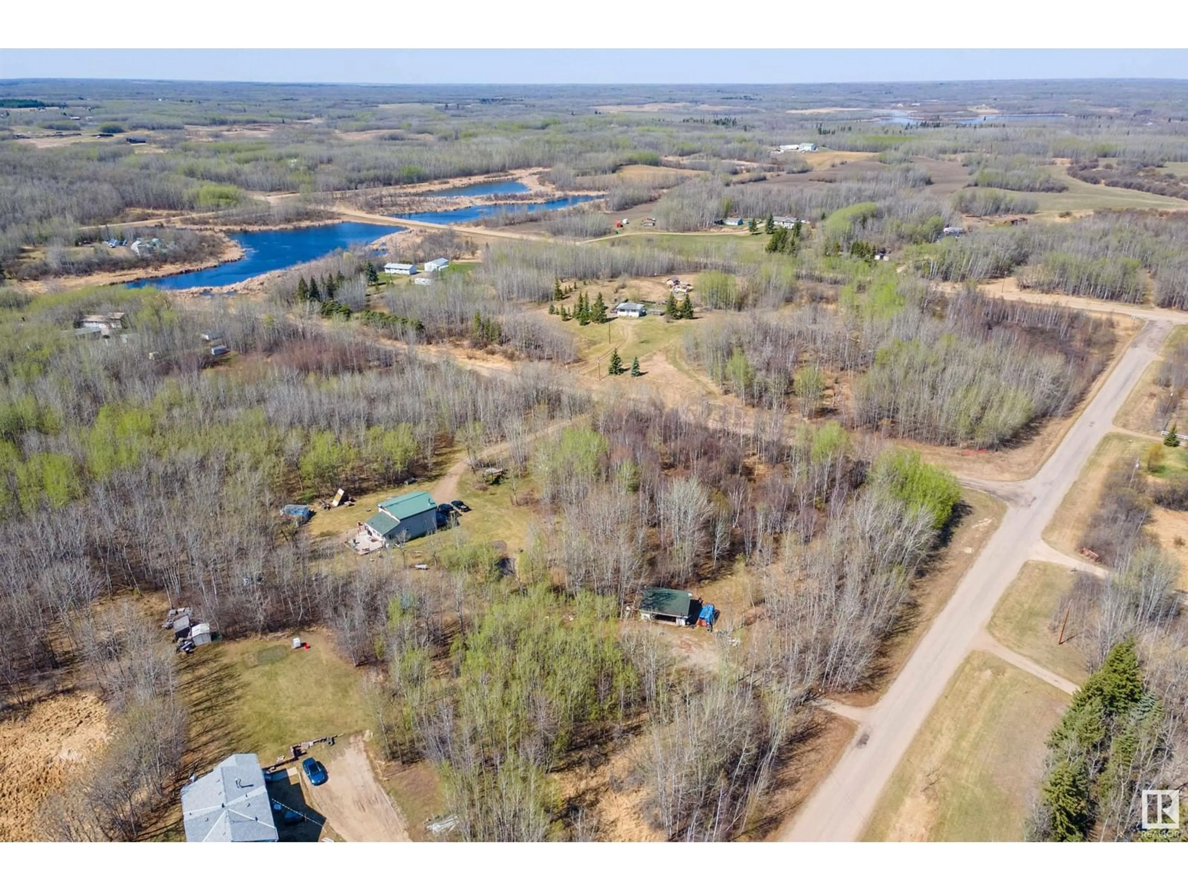 A pic from outside/outdoor area/front of a property/back of a property/a pic from drone, water/lake/river/ocean view for 50121 - 24 RR 204, Rural Beaver County Alberta T0B4J2