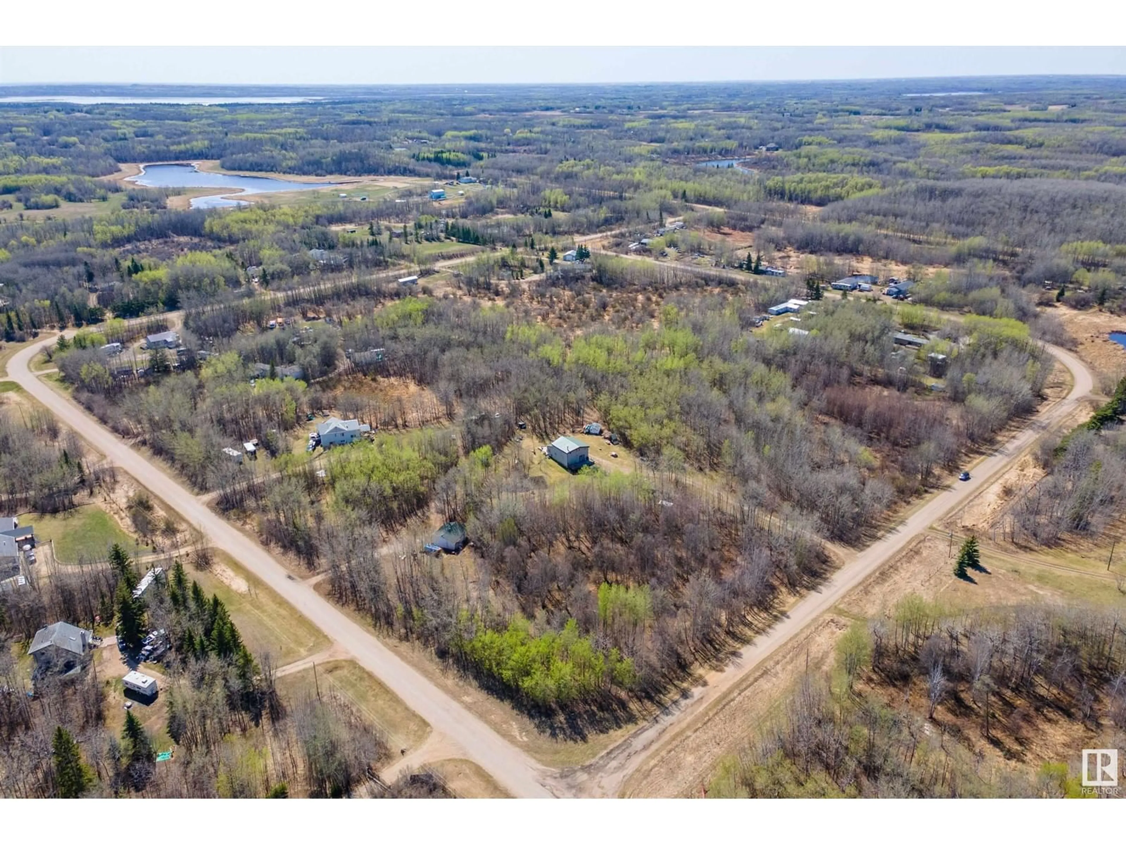 A pic from outside/outdoor area/front of a property/back of a property/a pic from drone, water/lake/river/ocean view for 50121 - 24 RR 204, Rural Beaver County Alberta T0B4J2