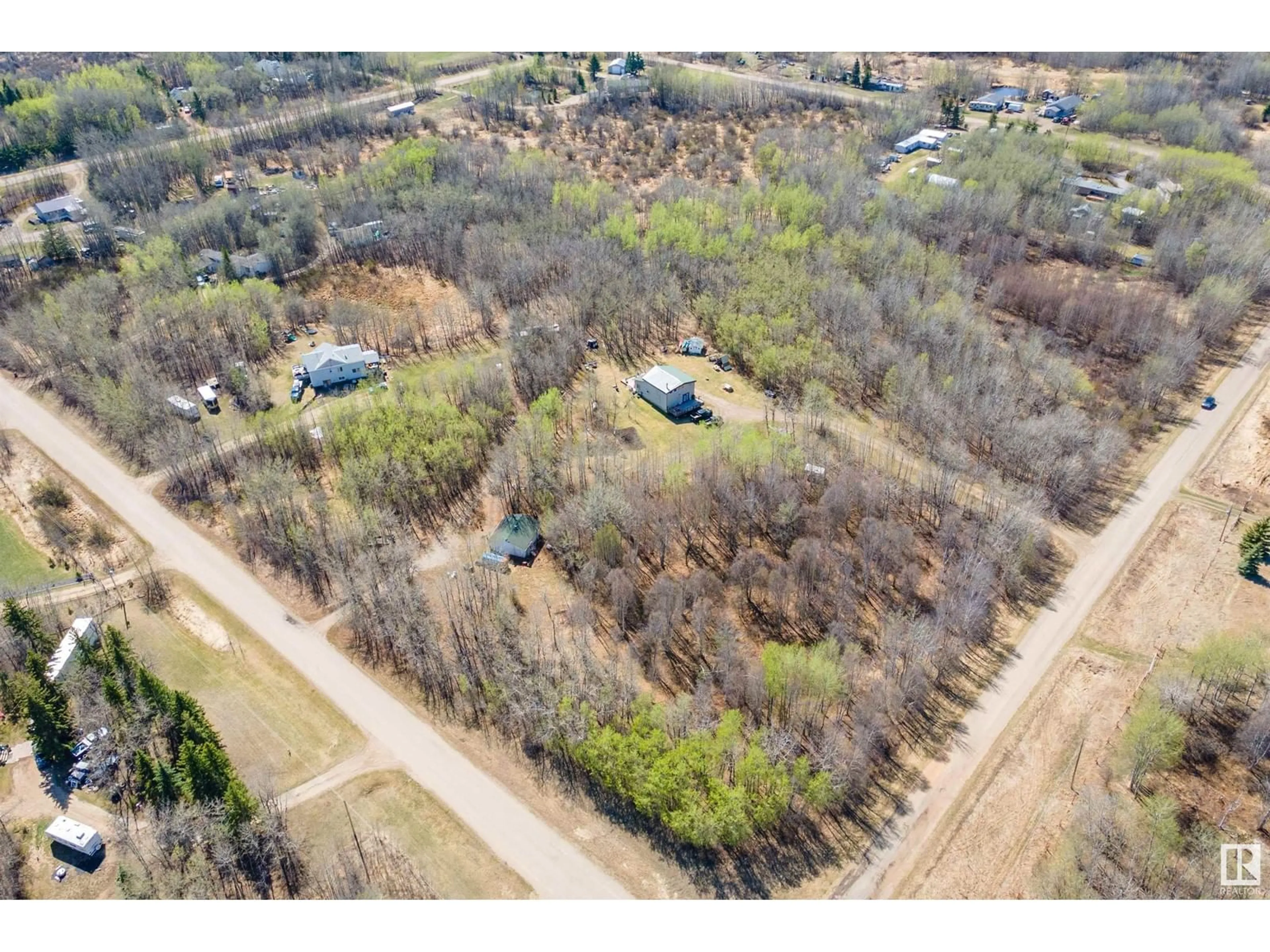 A pic from outside/outdoor area/front of a property/back of a property/a pic from drone, forest/trees view for 50121 - 24 RR 204, Rural Beaver County Alberta T0B4J2