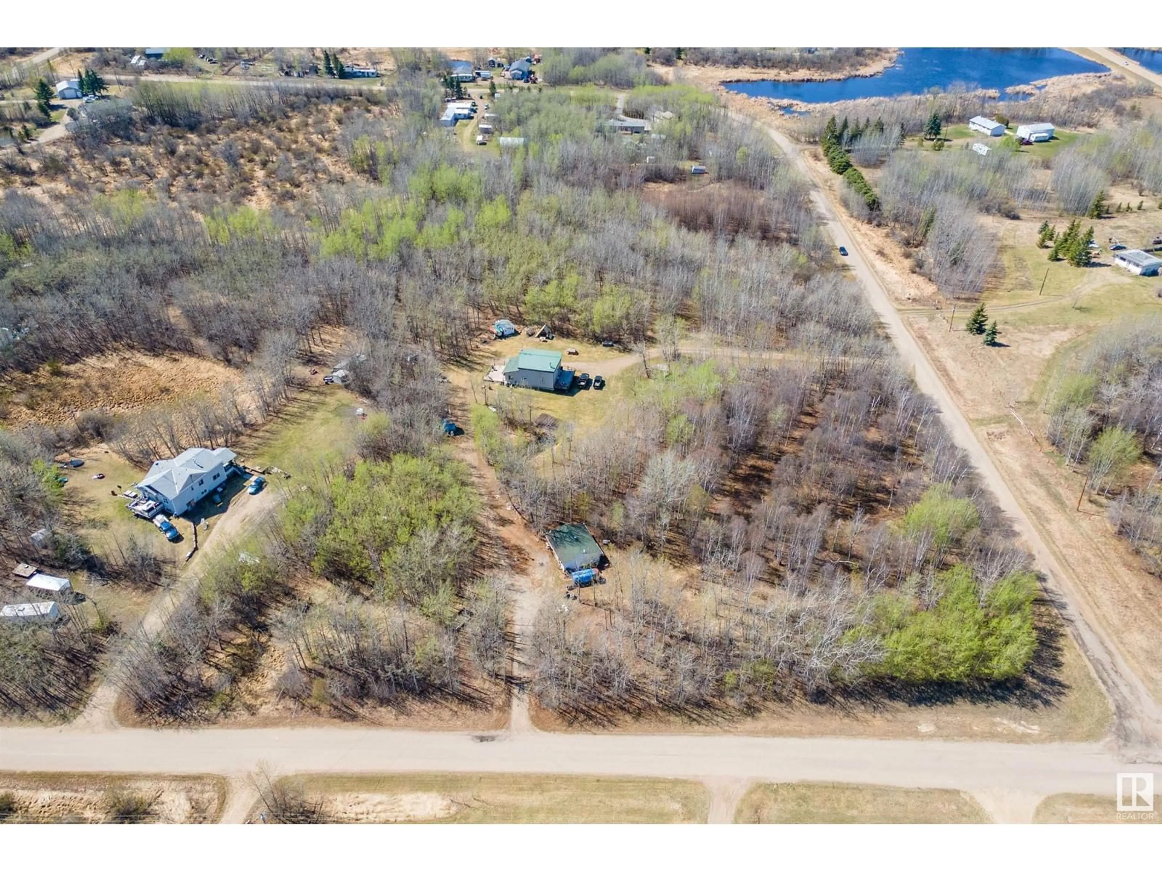 A pic from outside/outdoor area/front of a property/back of a property/a pic from drone, water/lake/river/ocean view for 50121 - 24 RR 204, Rural Beaver County Alberta T0B4J2
