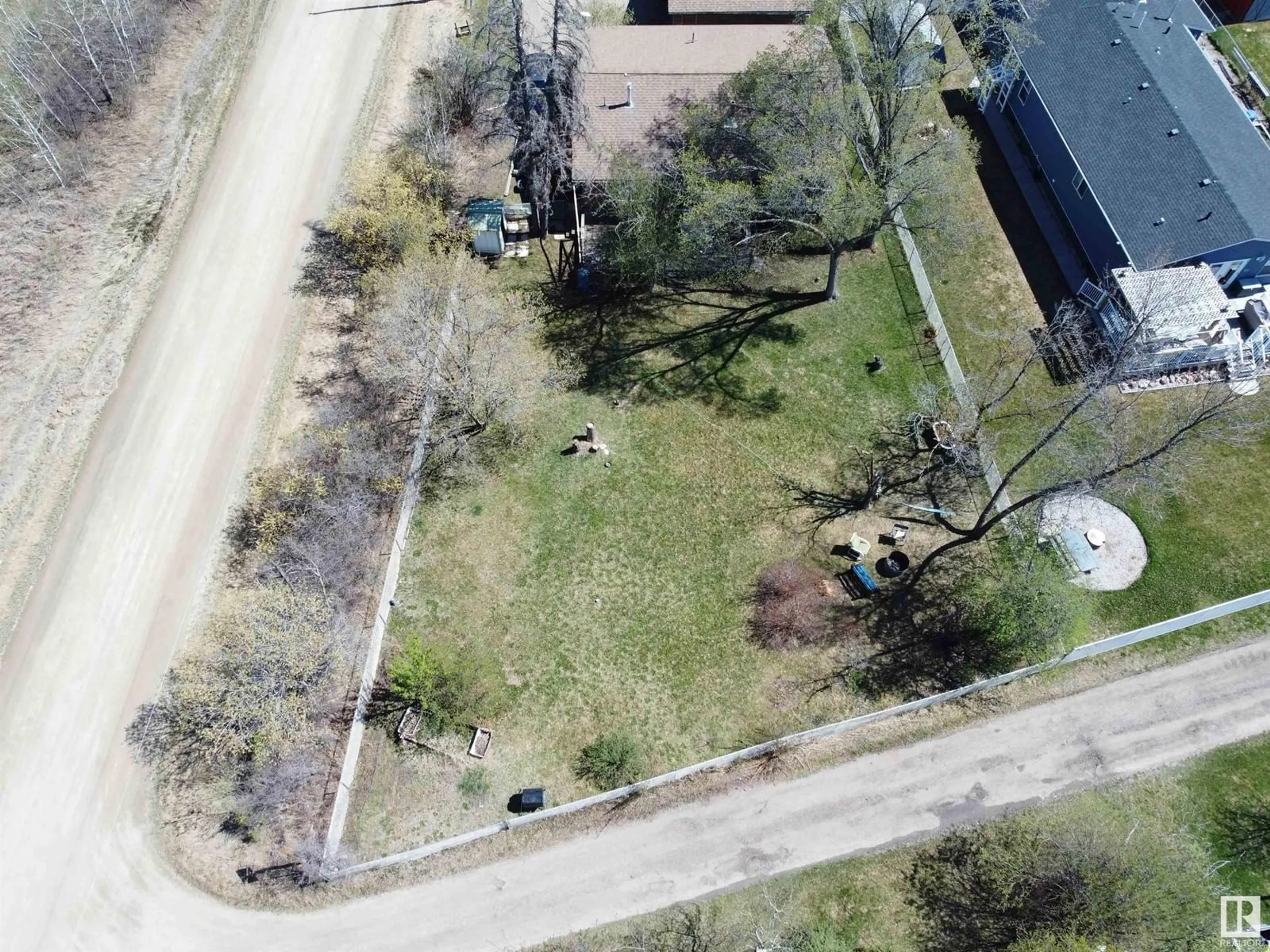 A pic from outside/outdoor area/front of a property/back of a property/a pic from drone, street for 43 - 53113 RGE ROAD 44, Rural Parkland County Alberta T0E2K0