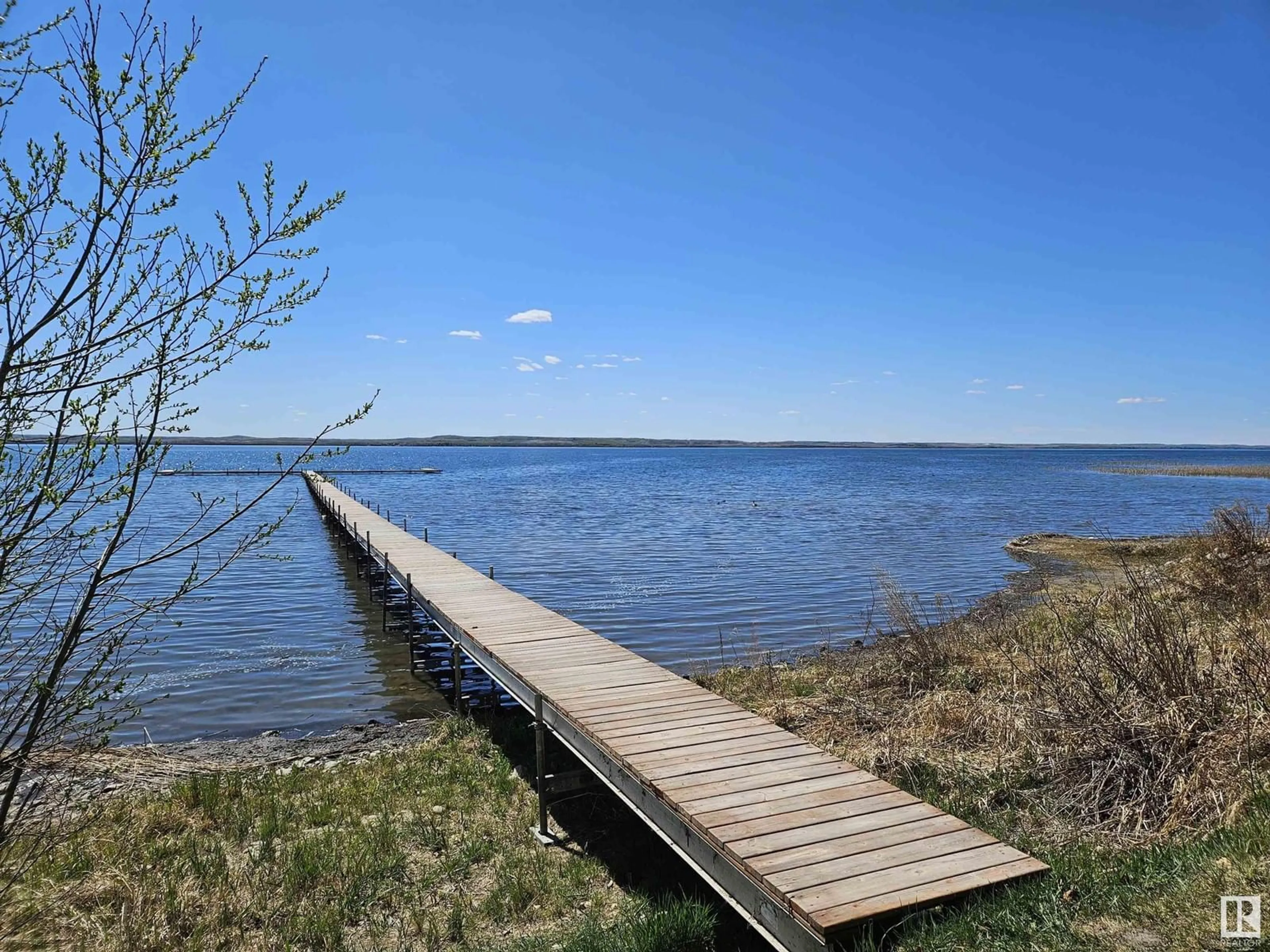 Patio, water/lake/river/ocean view for 43 - 53113 RGE ROAD 44, Rural Parkland County Alberta T0E2K0