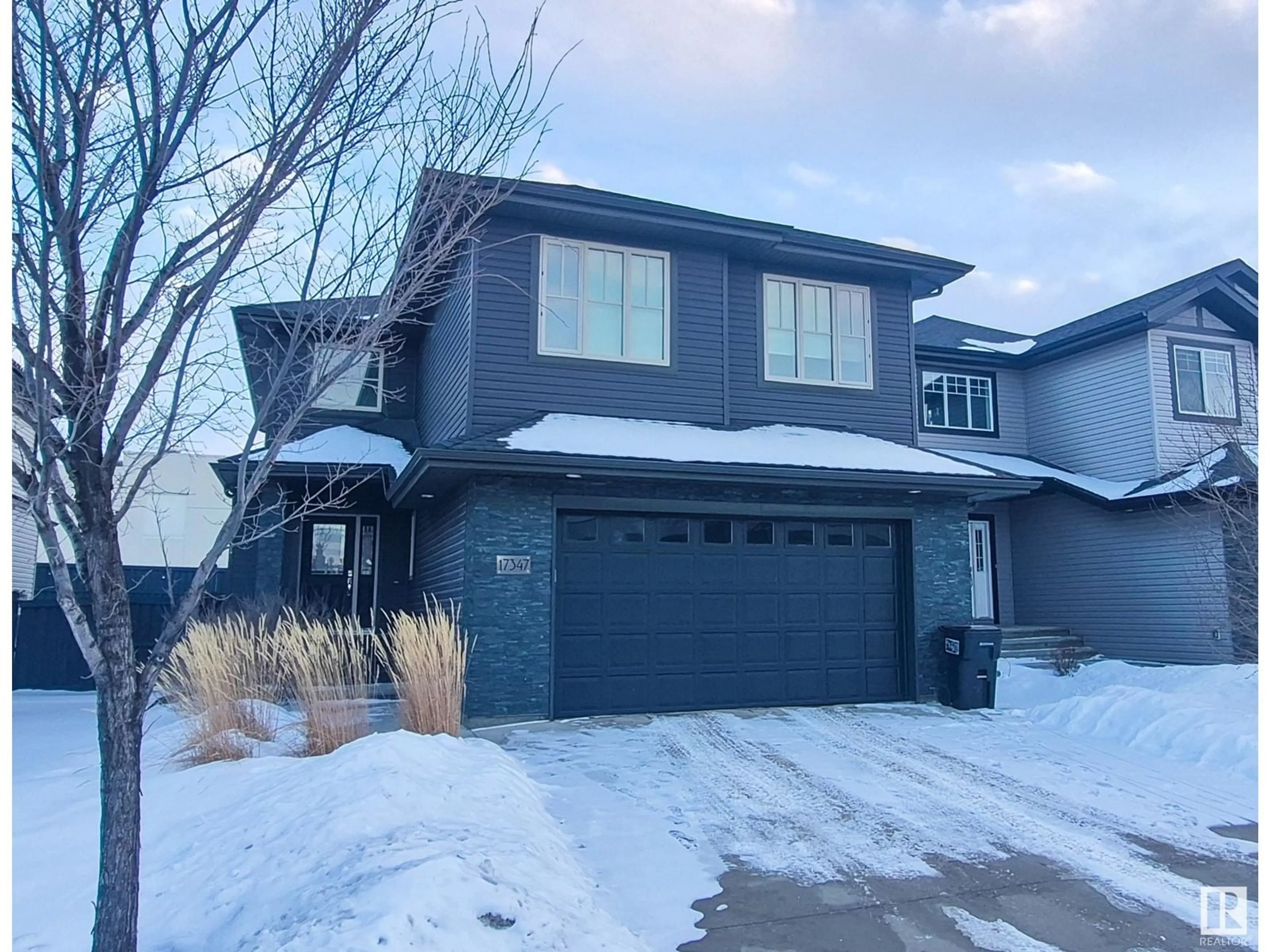 Home with vinyl exterior material, street for SW - 17347 11 AV, Edmonton Alberta T6W1Z6