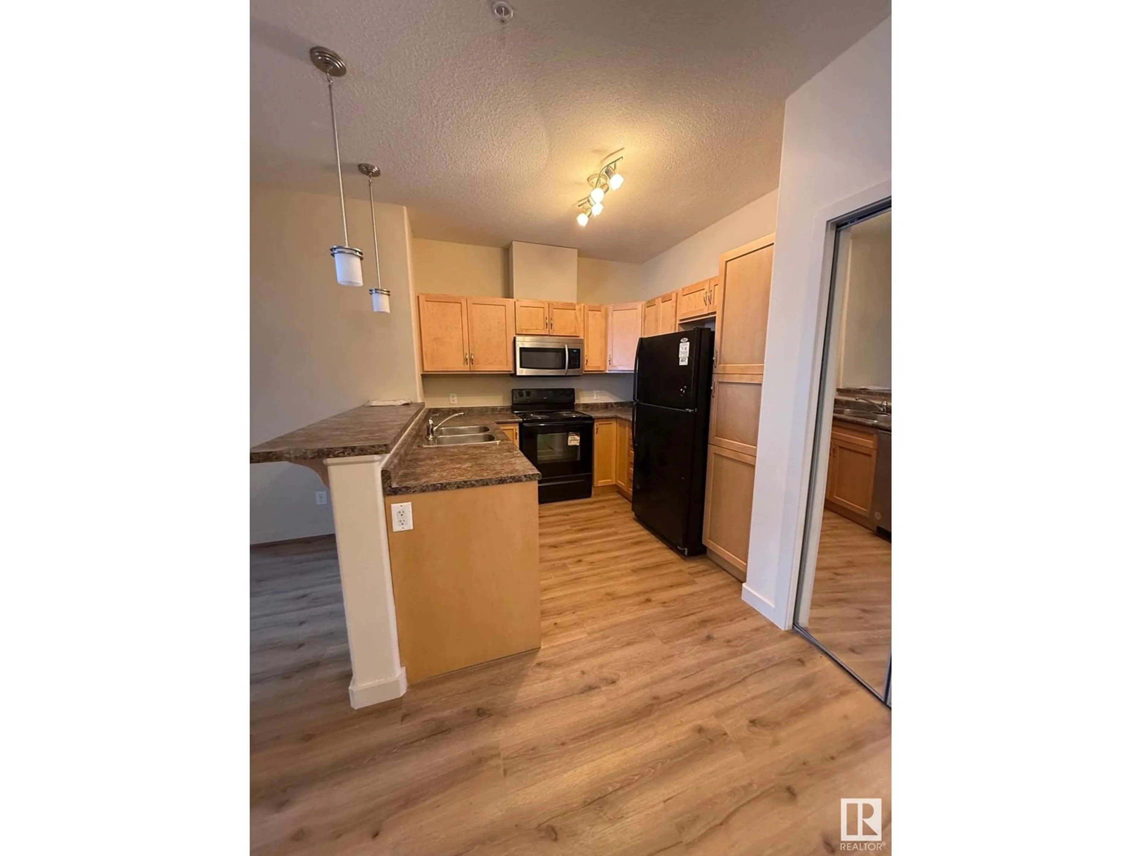 Standard kitchen, wood/laminate floor for #216 - 304 AMBLESIDE LINK LI, Edmonton Alberta T6W0V2
