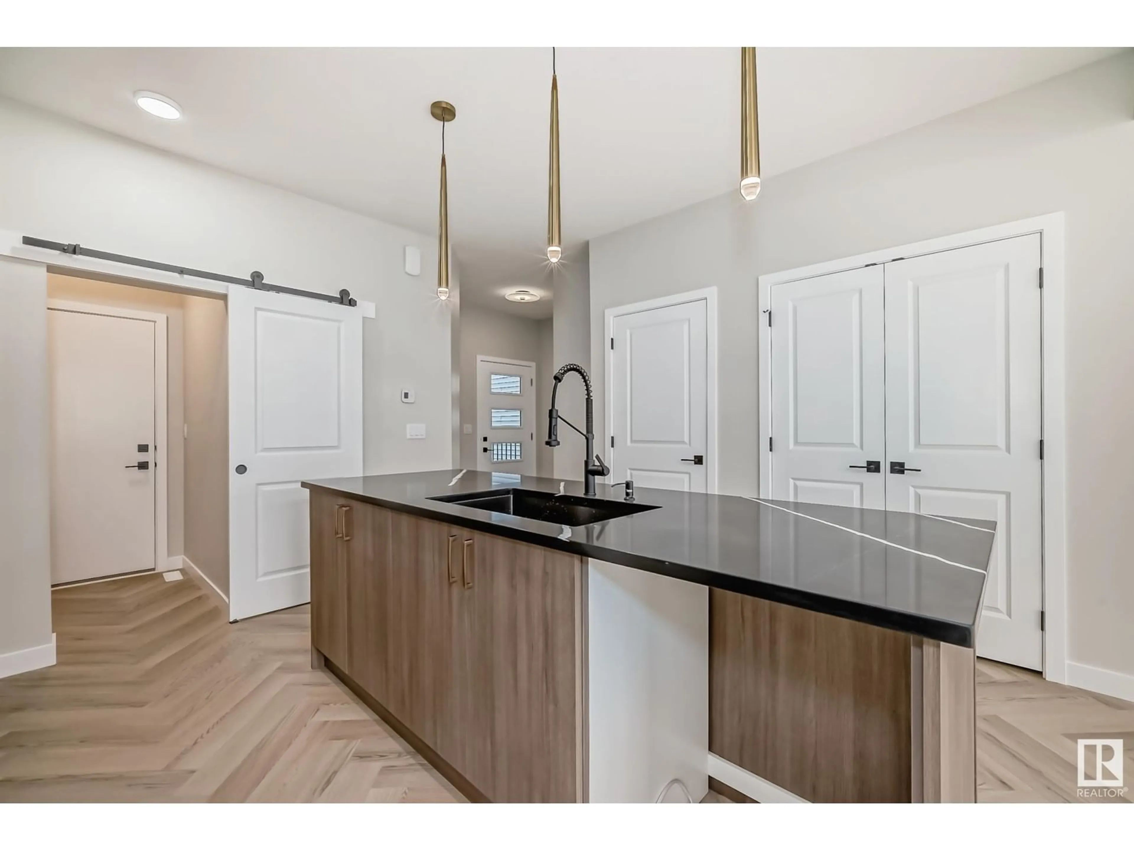 Open concept kitchen, unknown for SW - 8209 KIRIAK LO, Edmonton Alberta T6W5S2