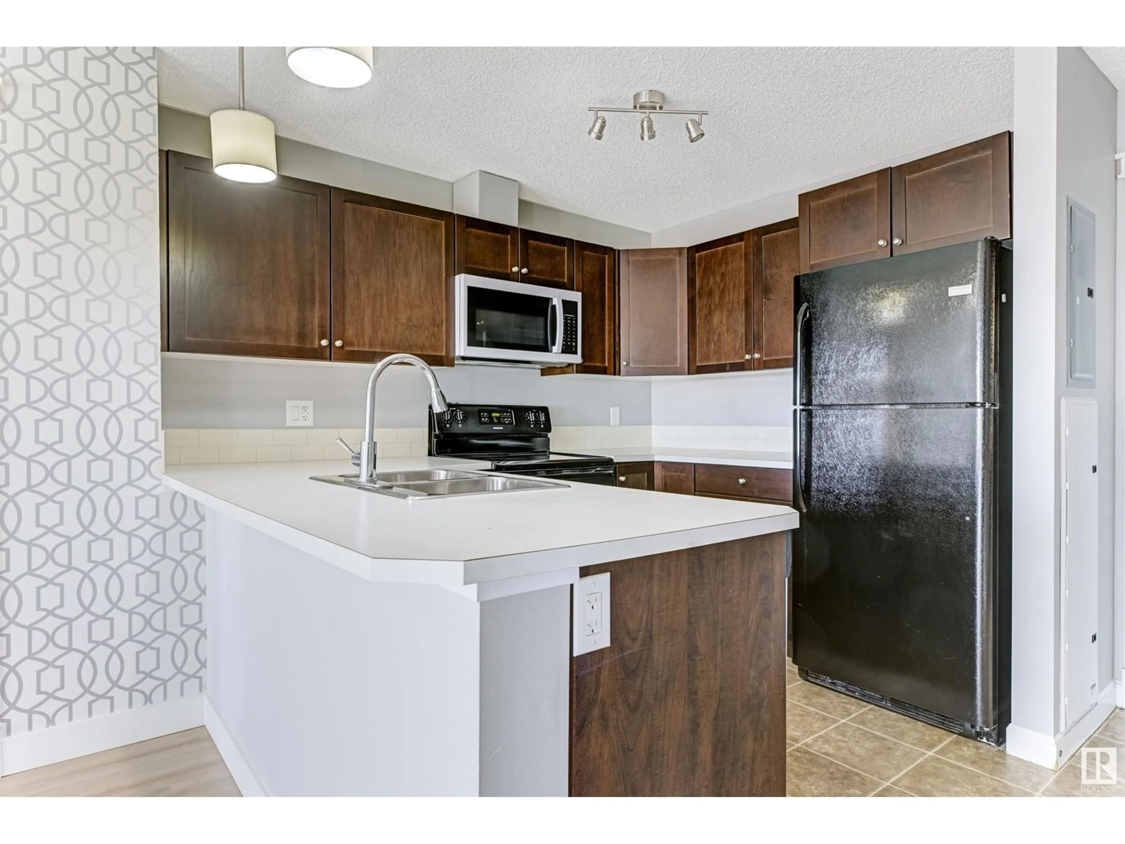 Standard kitchen, ceramic/tile floor for #205 - 3715 WHITELAW LN, Edmonton Alberta T6W2C3