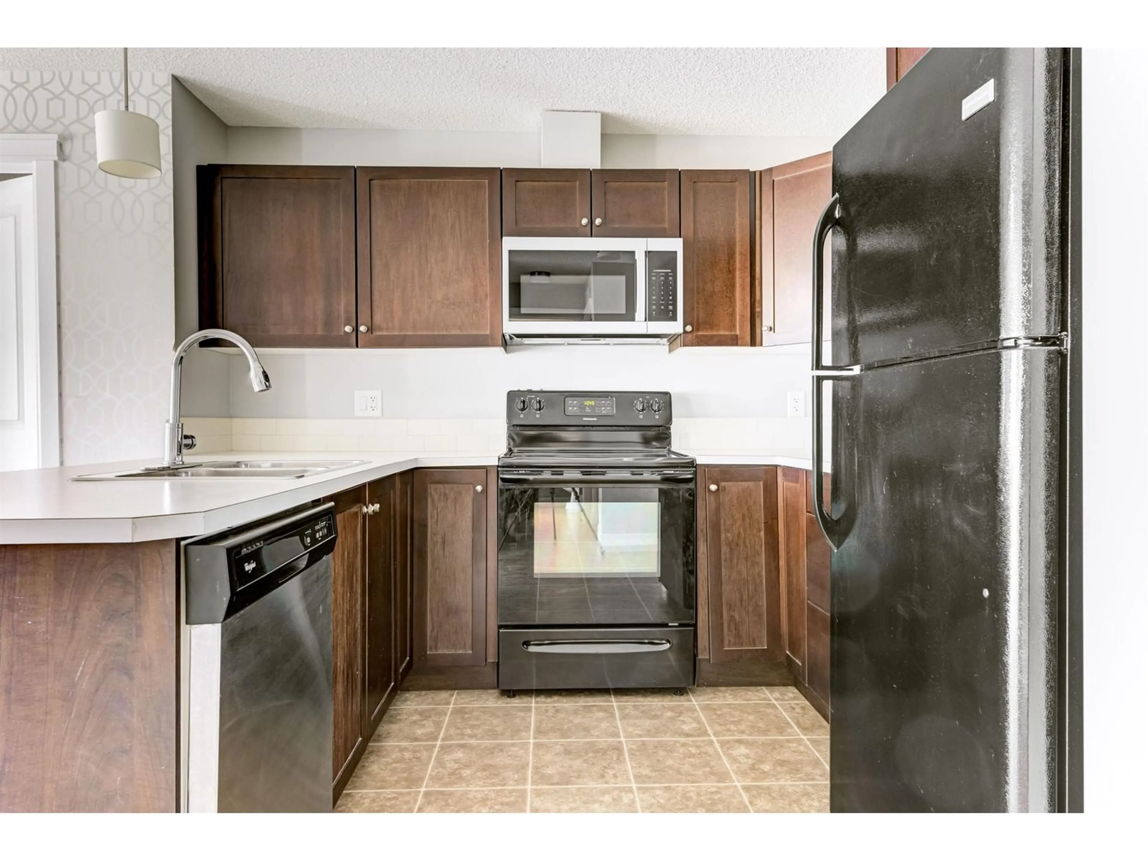 Standard kitchen, unknown for #205 - 3715 WHITELAW LN, Edmonton Alberta T6W2C3