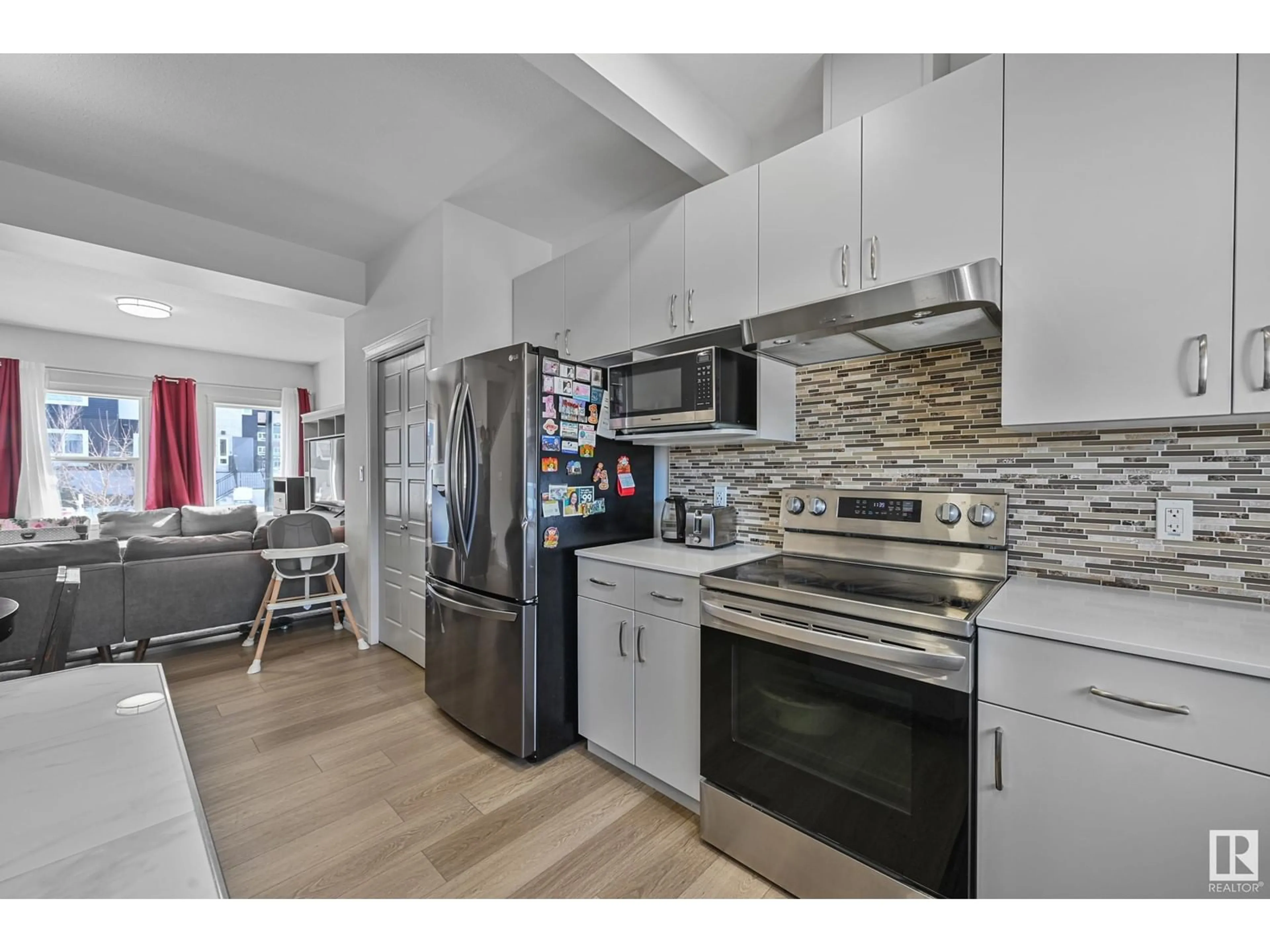 Open concept kitchen, unknown for NW - 17716 63 ST, Edmonton Alberta T5Y3C5