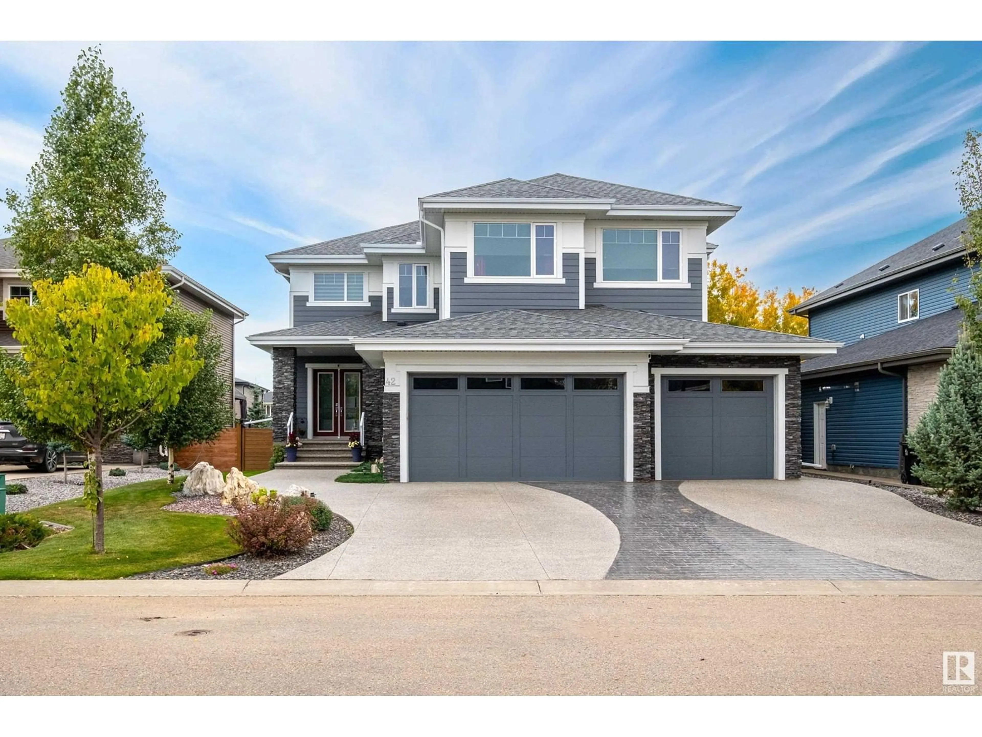 Home with vinyl exterior material, street for 42 KENTON WOODS LN, Spruce Grove Alberta T7X0P8