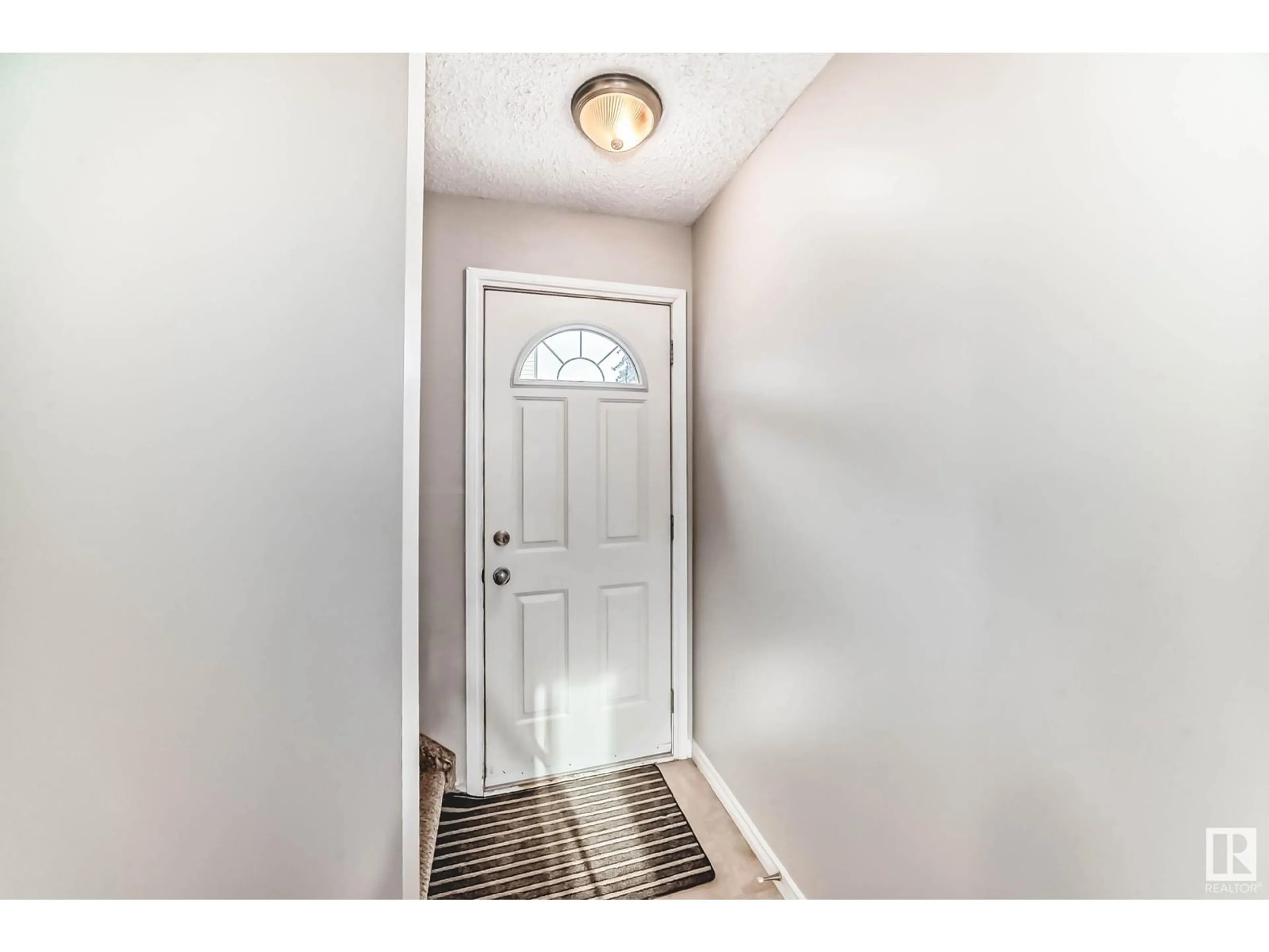 Indoor entryway for 14311 23 ST, Edmonton Alberta T5Y1N1