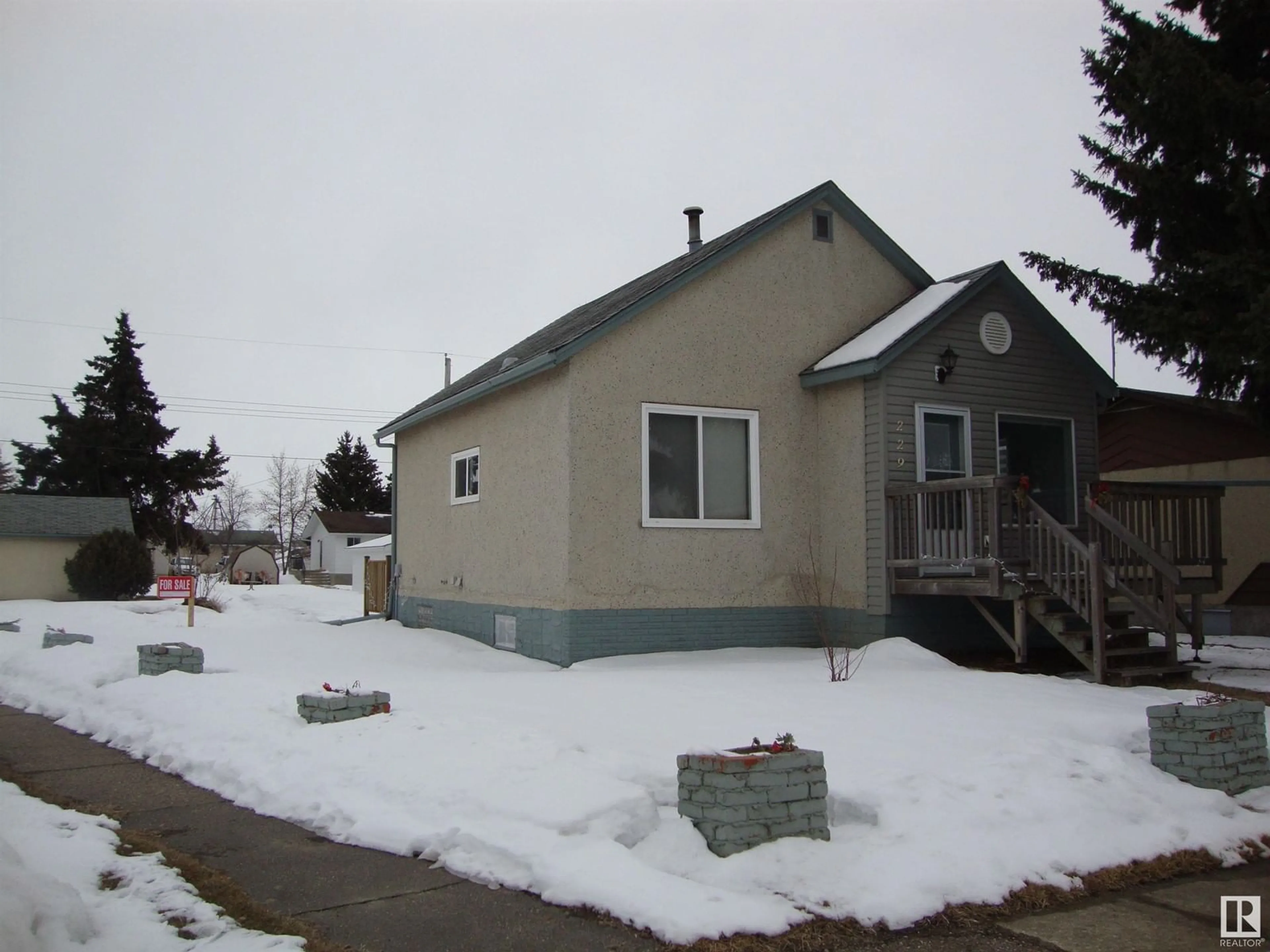 Home with vinyl exterior material, street for 229 6TH ST, Thorhild Alberta T0A3J0