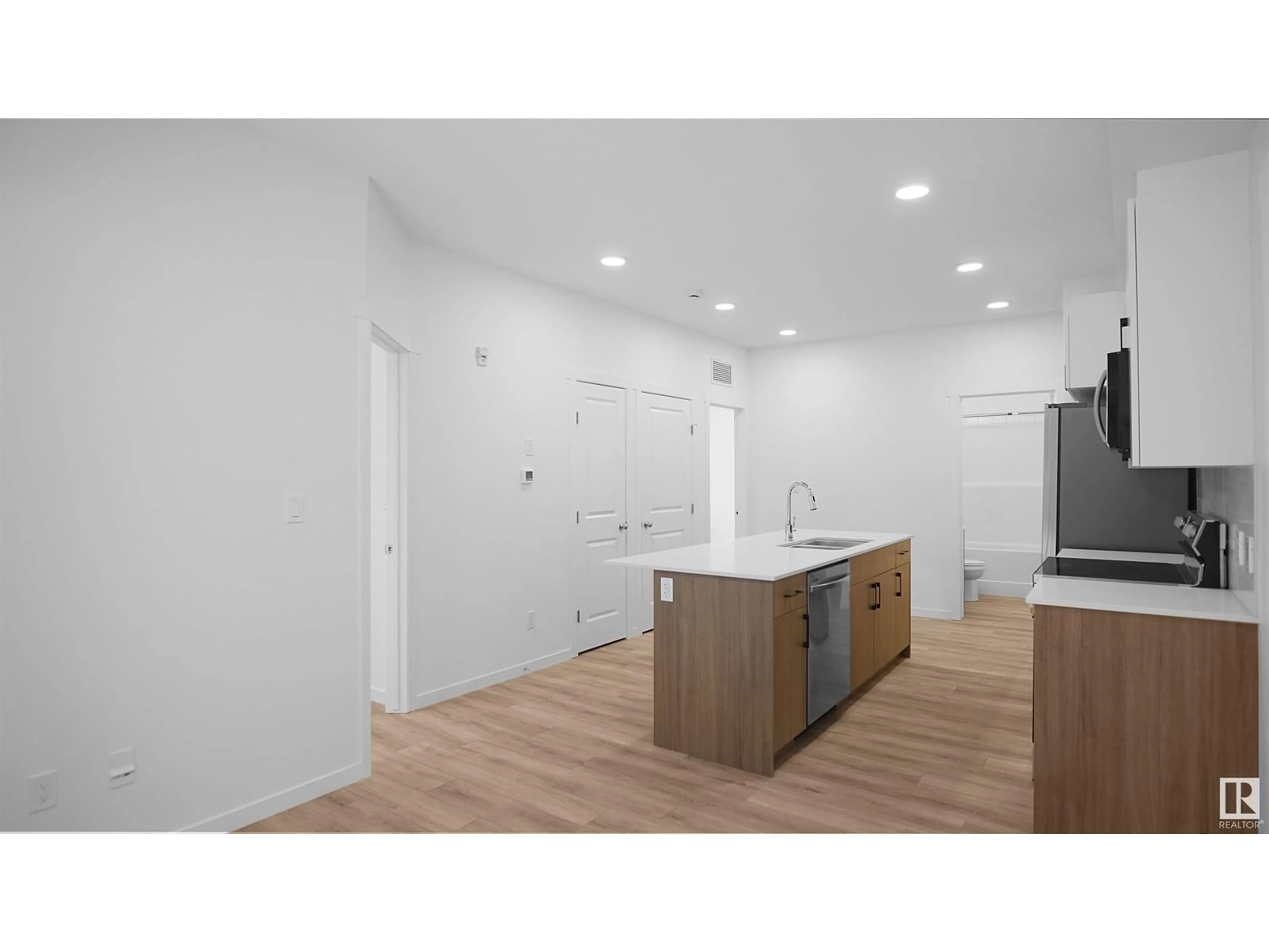 Open concept kitchen, unknown for #103 - 9215 228 ST, Edmonton Alberta T5T7R9