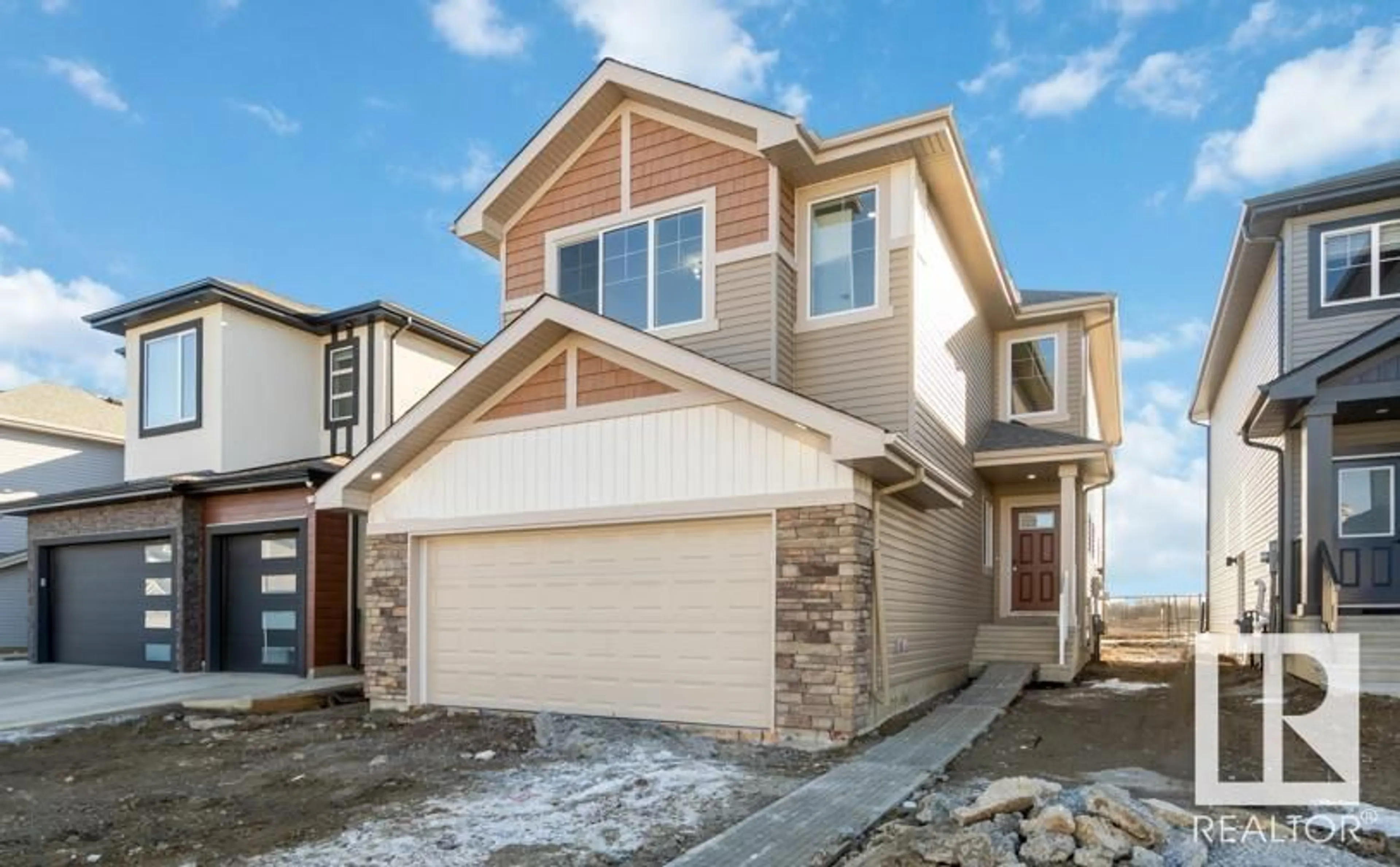Home with vinyl exterior material, street for NW - 1651 12 ST, Edmonton Alberta T6T2V1