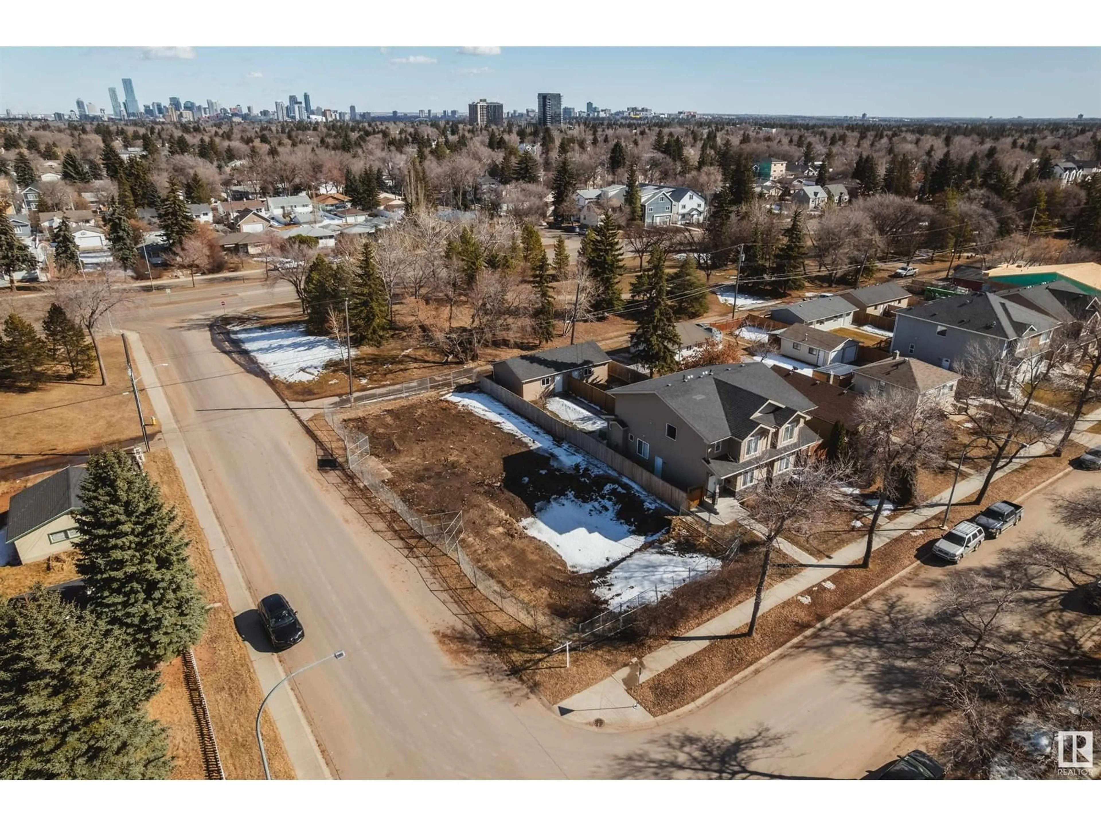 Living room with furniture, wood/laminate floor for NW - 10545 150 ST, Edmonton Alberta T5P1P9
