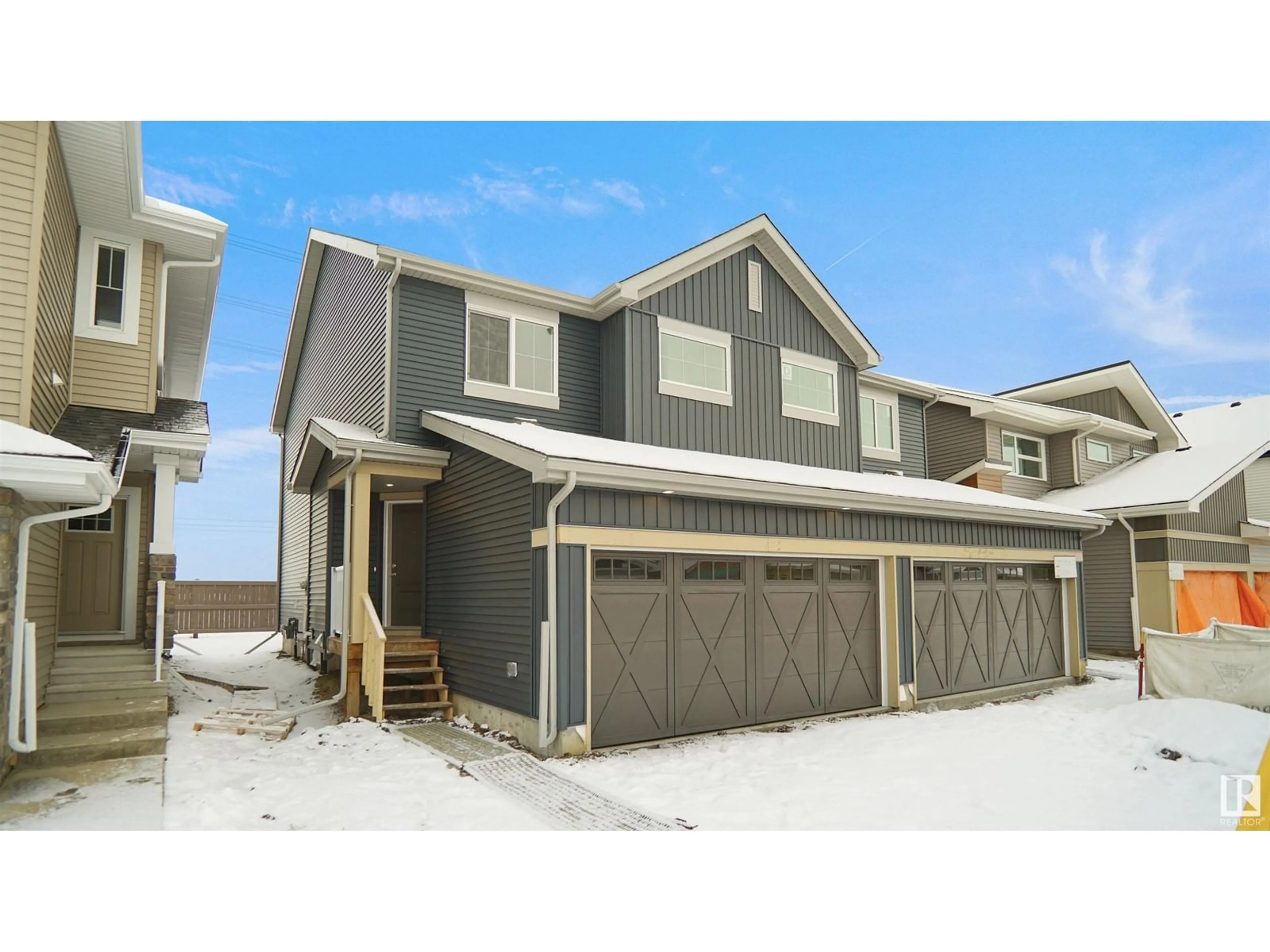 Home with vinyl exterior material, street for 105 FICUS WY, Fort Saskatchewan Alberta T8L0Z6