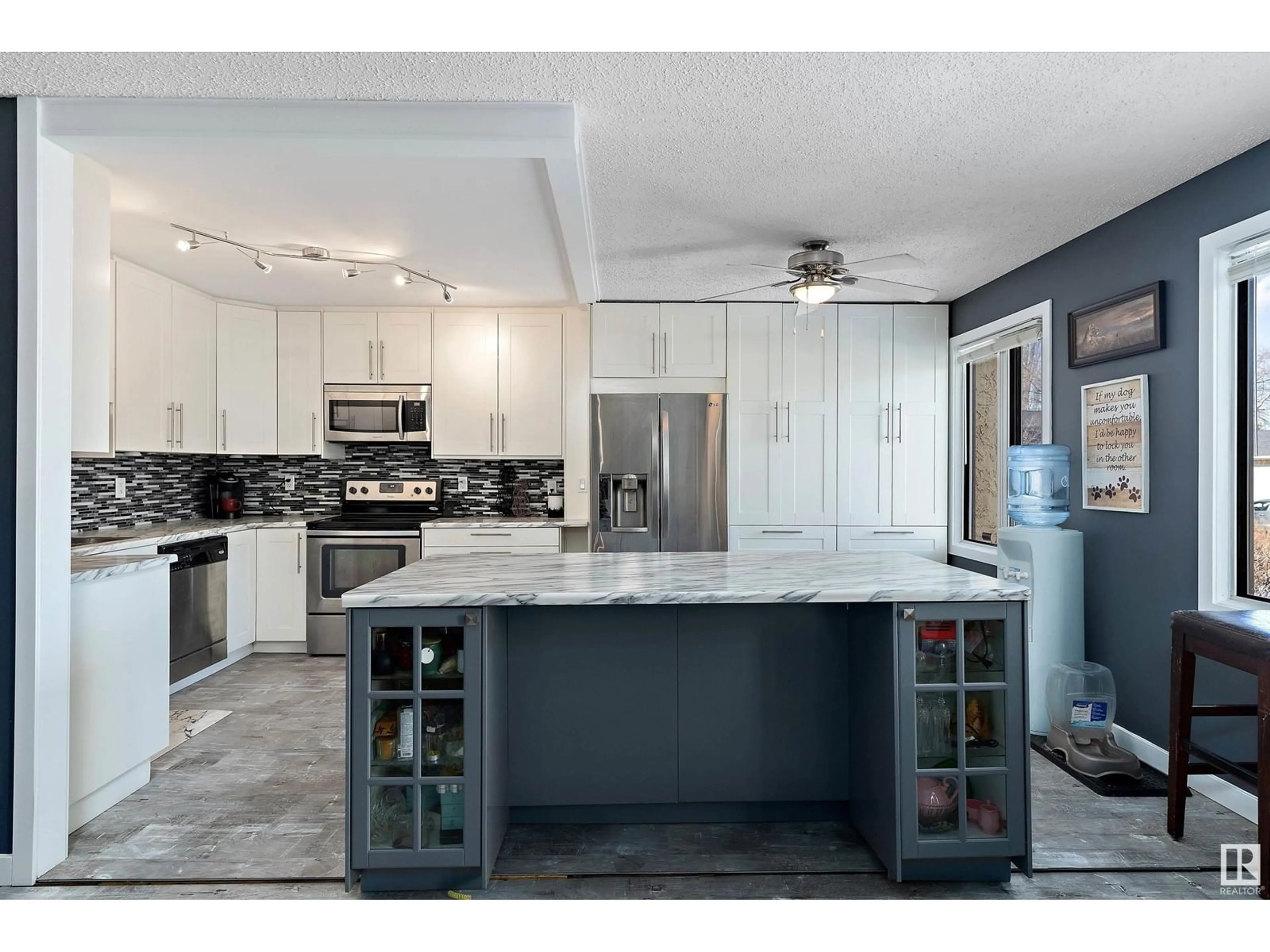 Open concept kitchen, ceramic/tile floor for 1208 65 ST NW, Edmonton Alberta T6L2E7