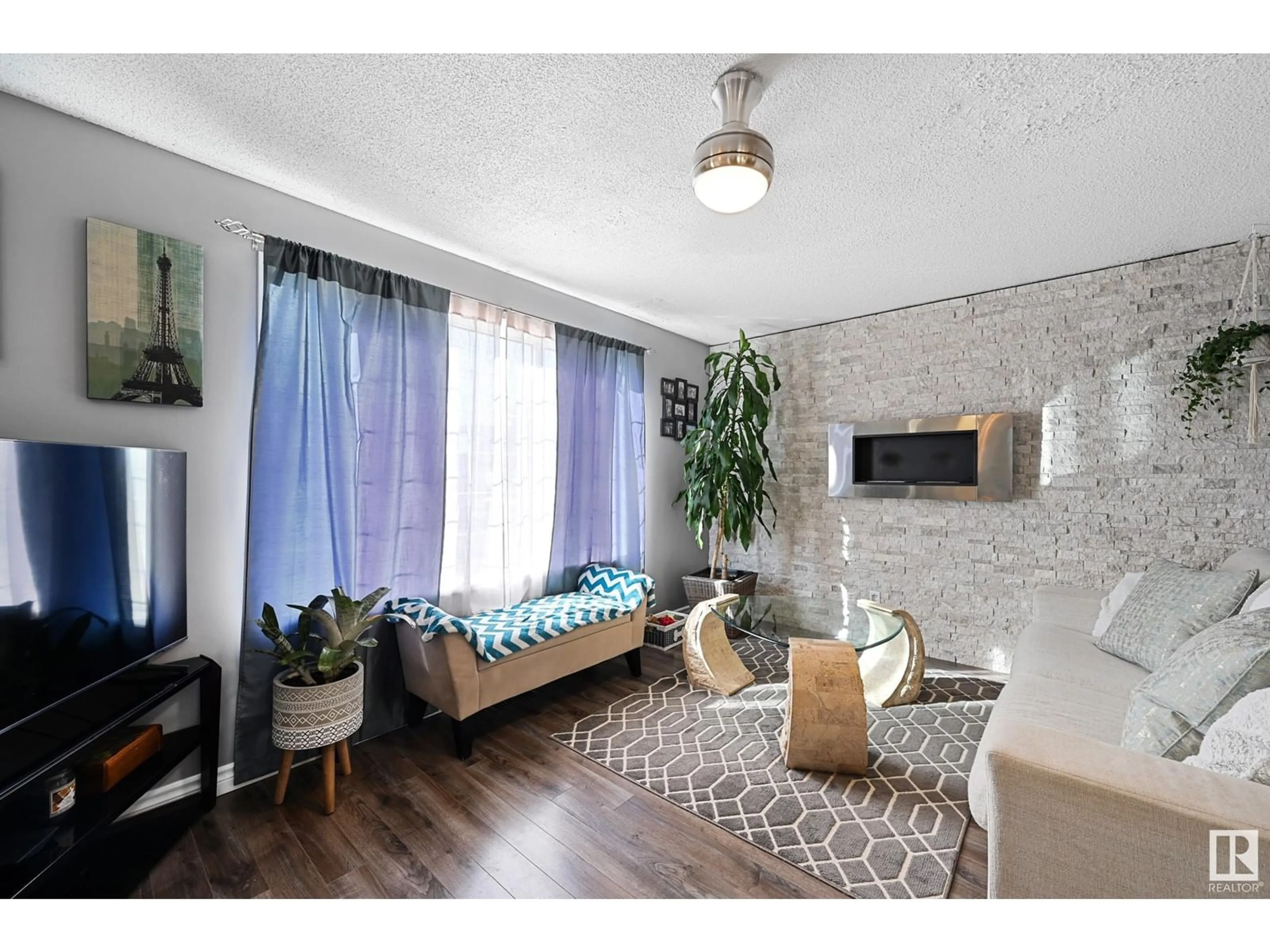 Living room with furniture, unknown for 16225 57 ST NW, Edmonton Alberta T5Y2V2