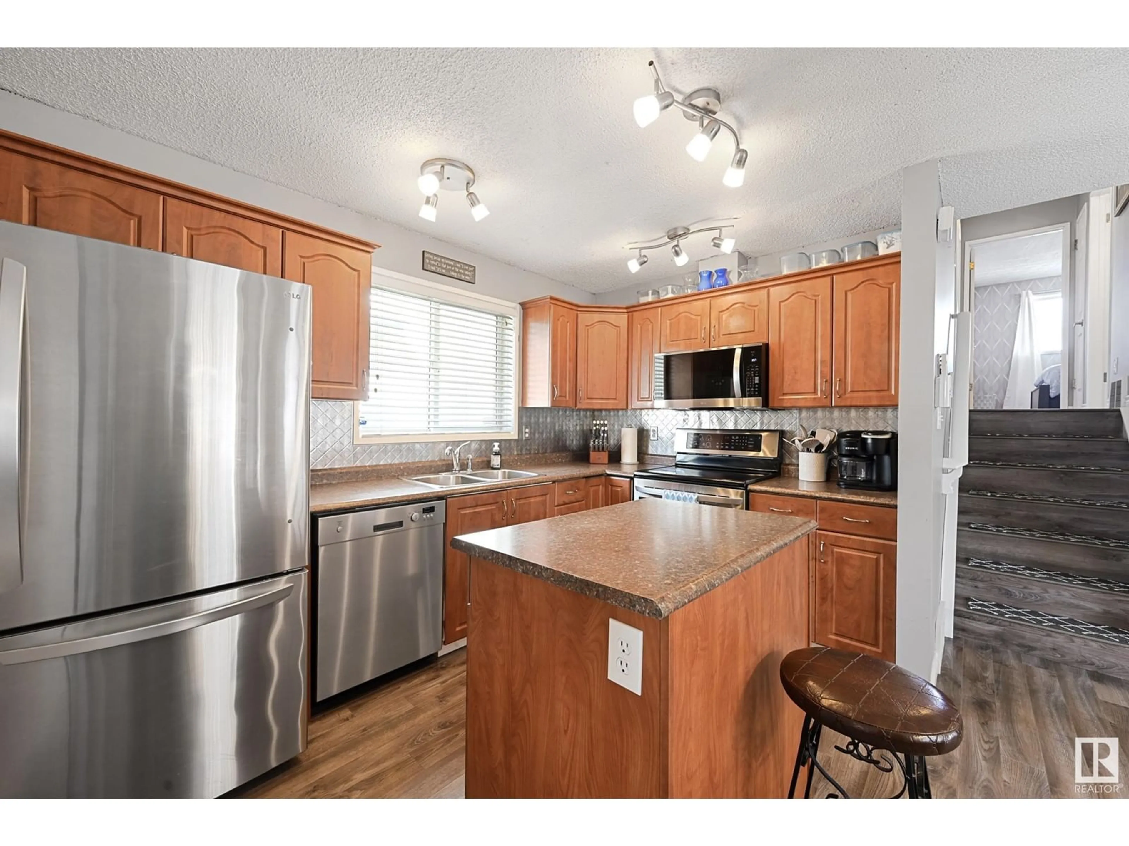 Standard kitchen, wood/laminate floor for 16225 57 ST NW, Edmonton Alberta T5Y2V2