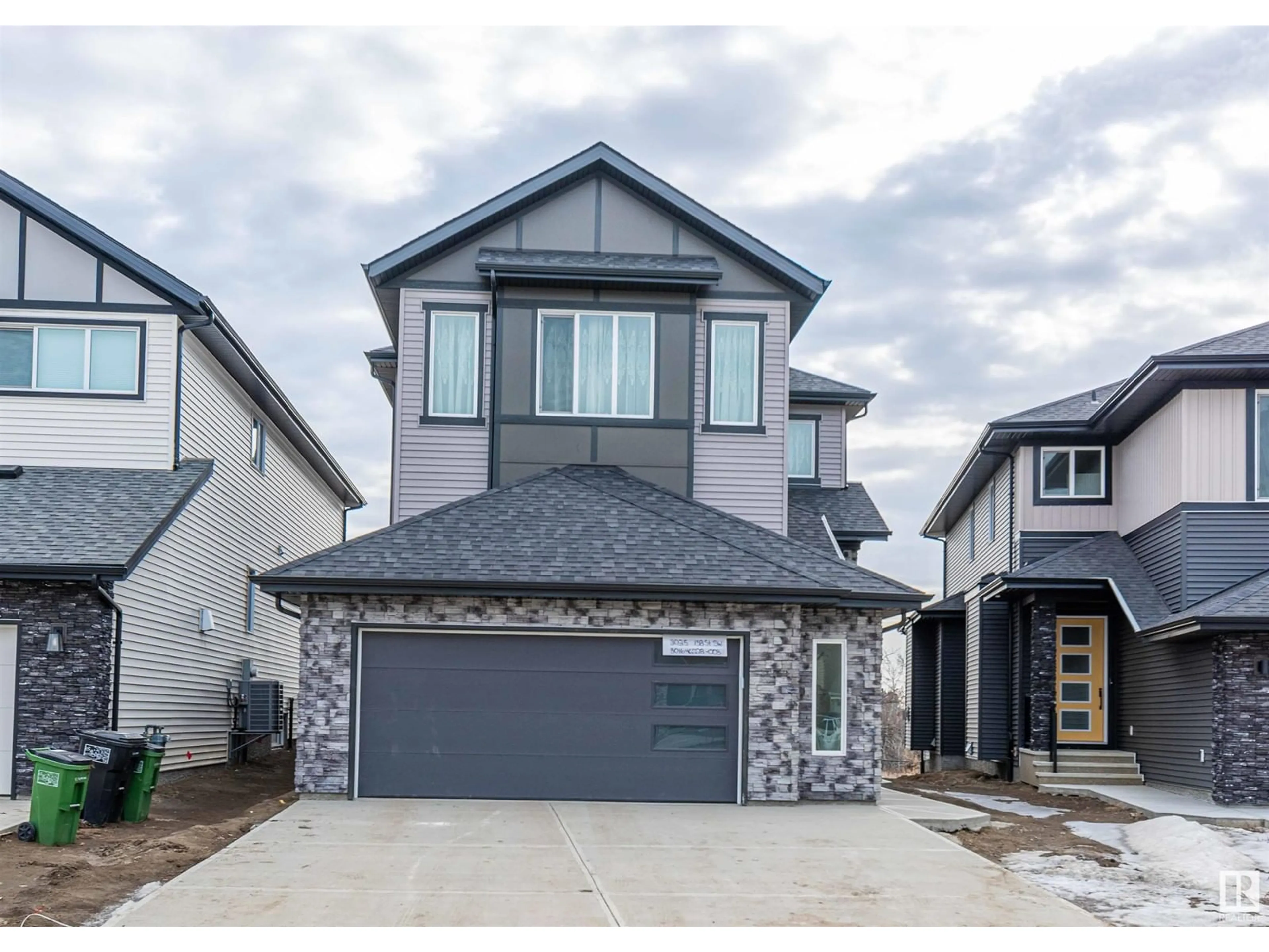 Home with vinyl exterior material, street for SW - 3035 158 ST, Edmonton Alberta T6W5H5