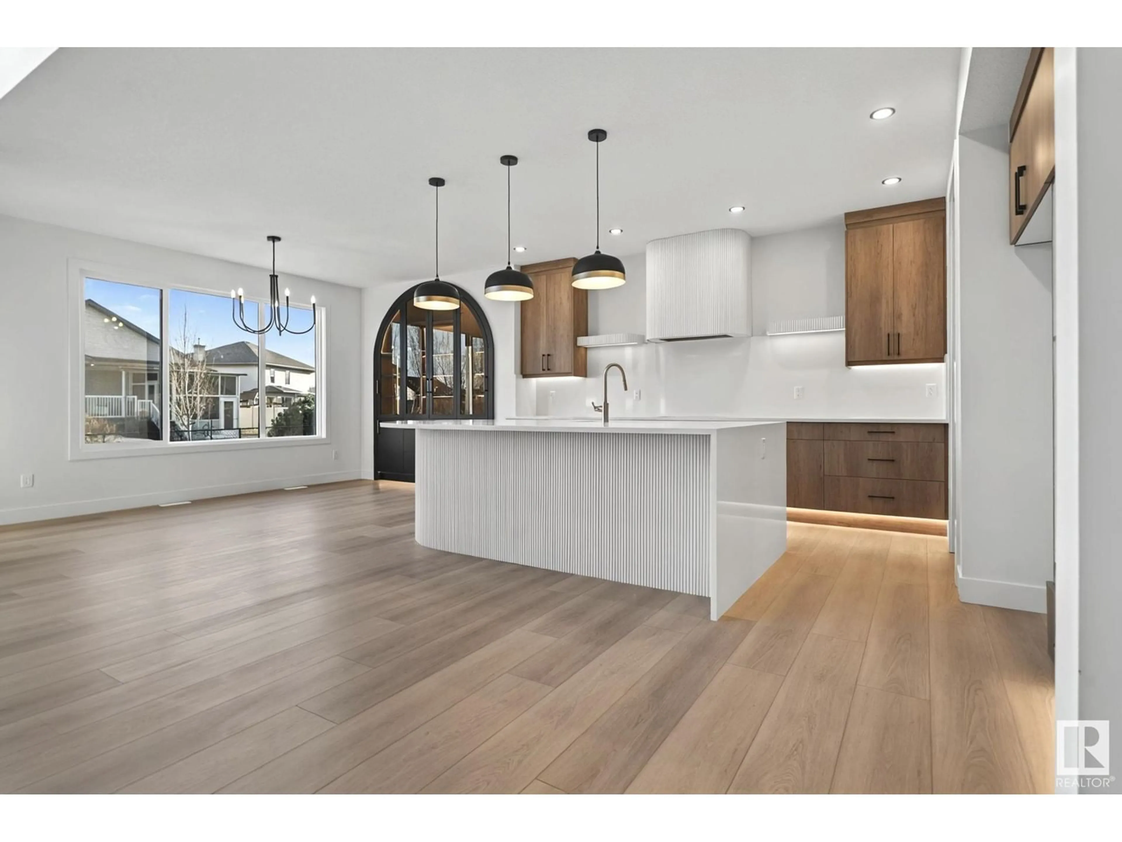 Open concept kitchen, wood/laminate floor for NE - 283 165 AV, Edmonton Alberta T5Y0P6