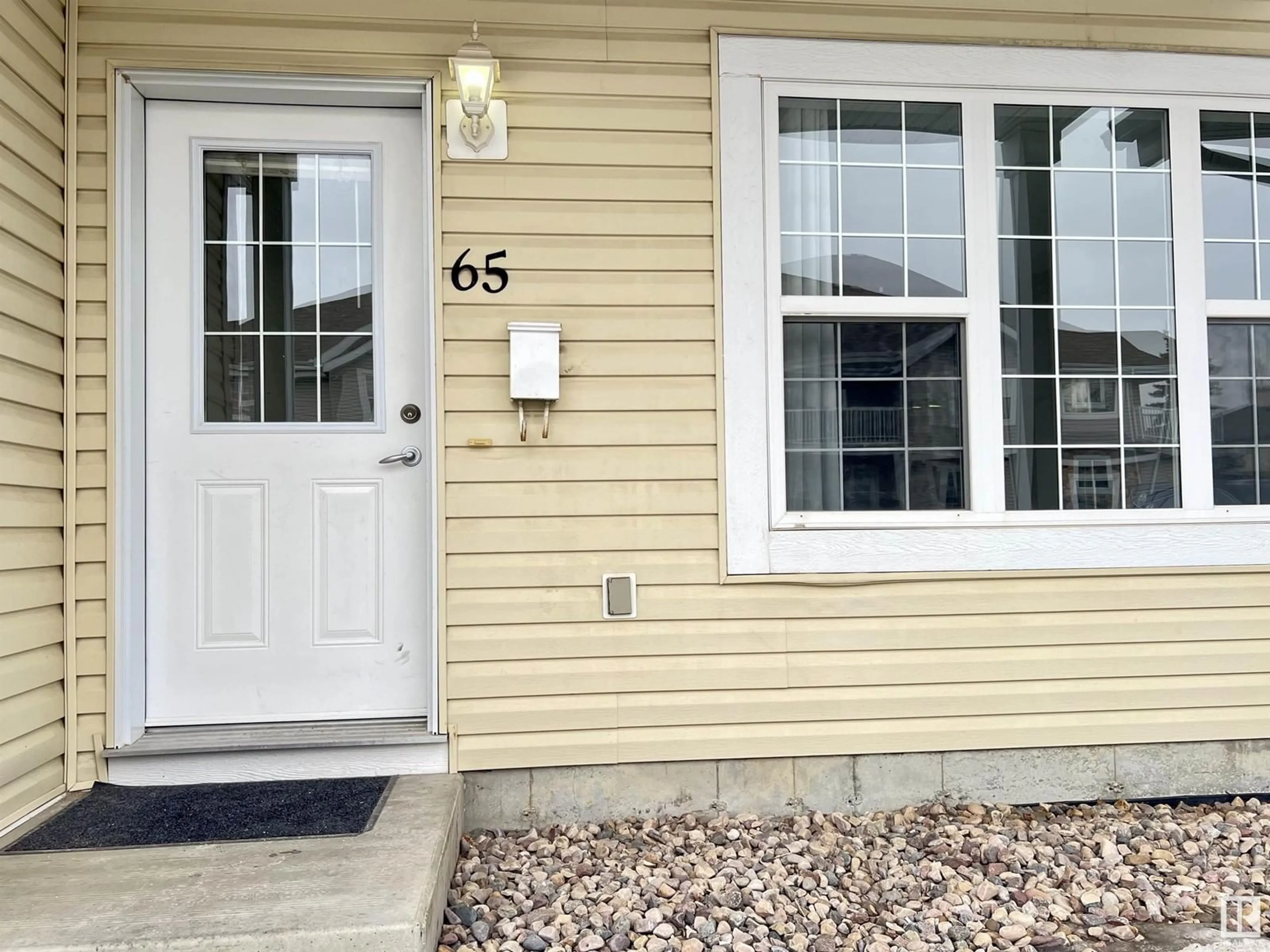 Home with vinyl exterior material, street for #65 - 150 EDWARDS DR, Edmonton Alberta T6X1M4
