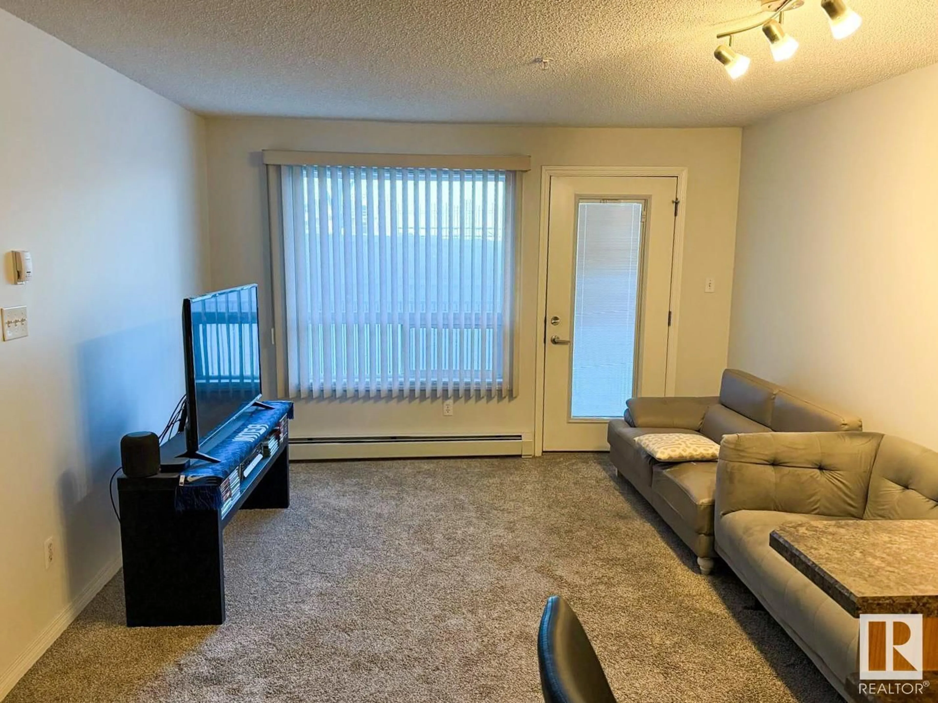 Living room with furniture, unknown for #1117 - 1117 CLAREVIEW STATION DR, Edmonton Alberta T5Y0E6