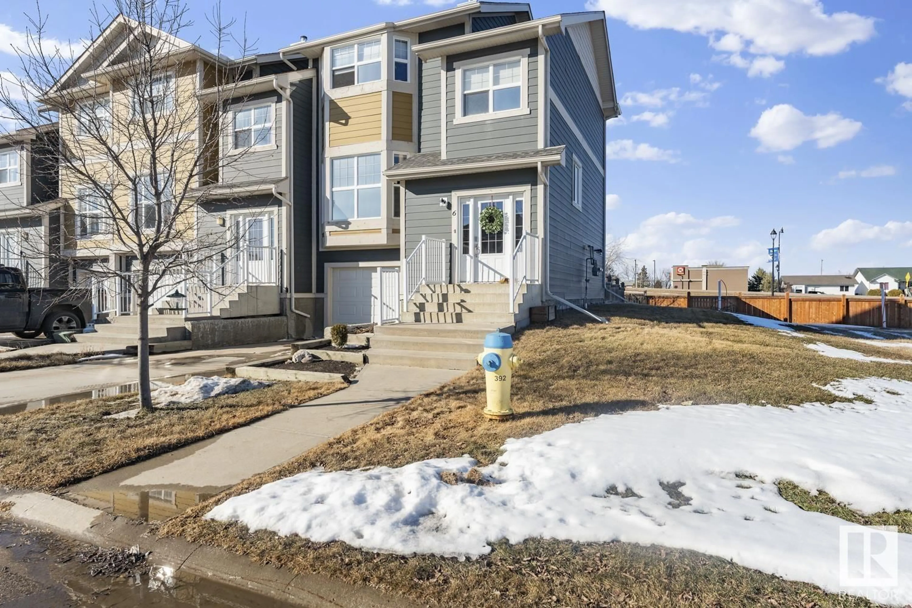 Home with vinyl exterior material, street for 6 - 1501 8 AV, Cold Lake Alberta T9M0C9