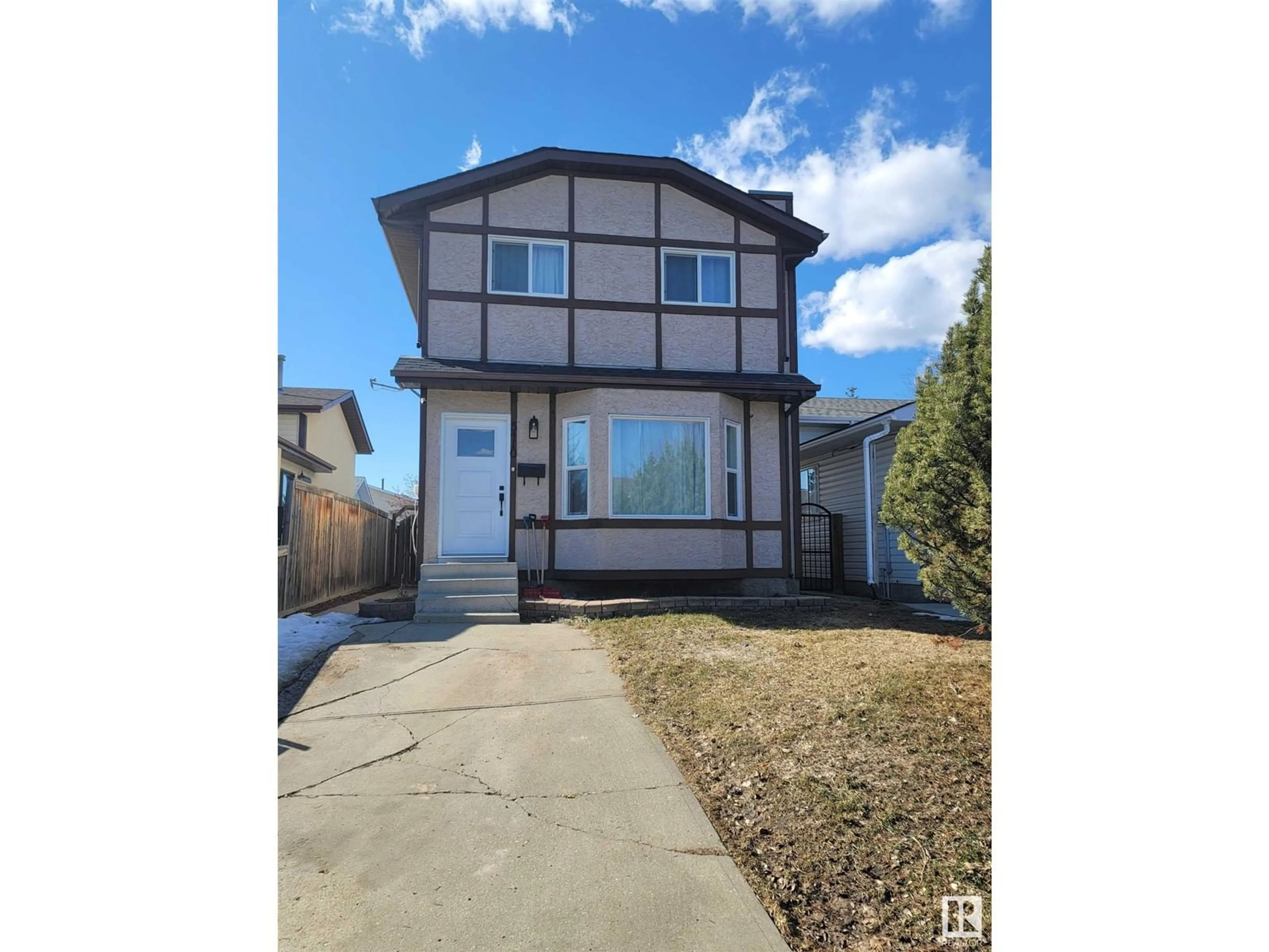 Home with vinyl exterior material, street for 5410 188 ST, Edmonton Alberta T6M1Z6