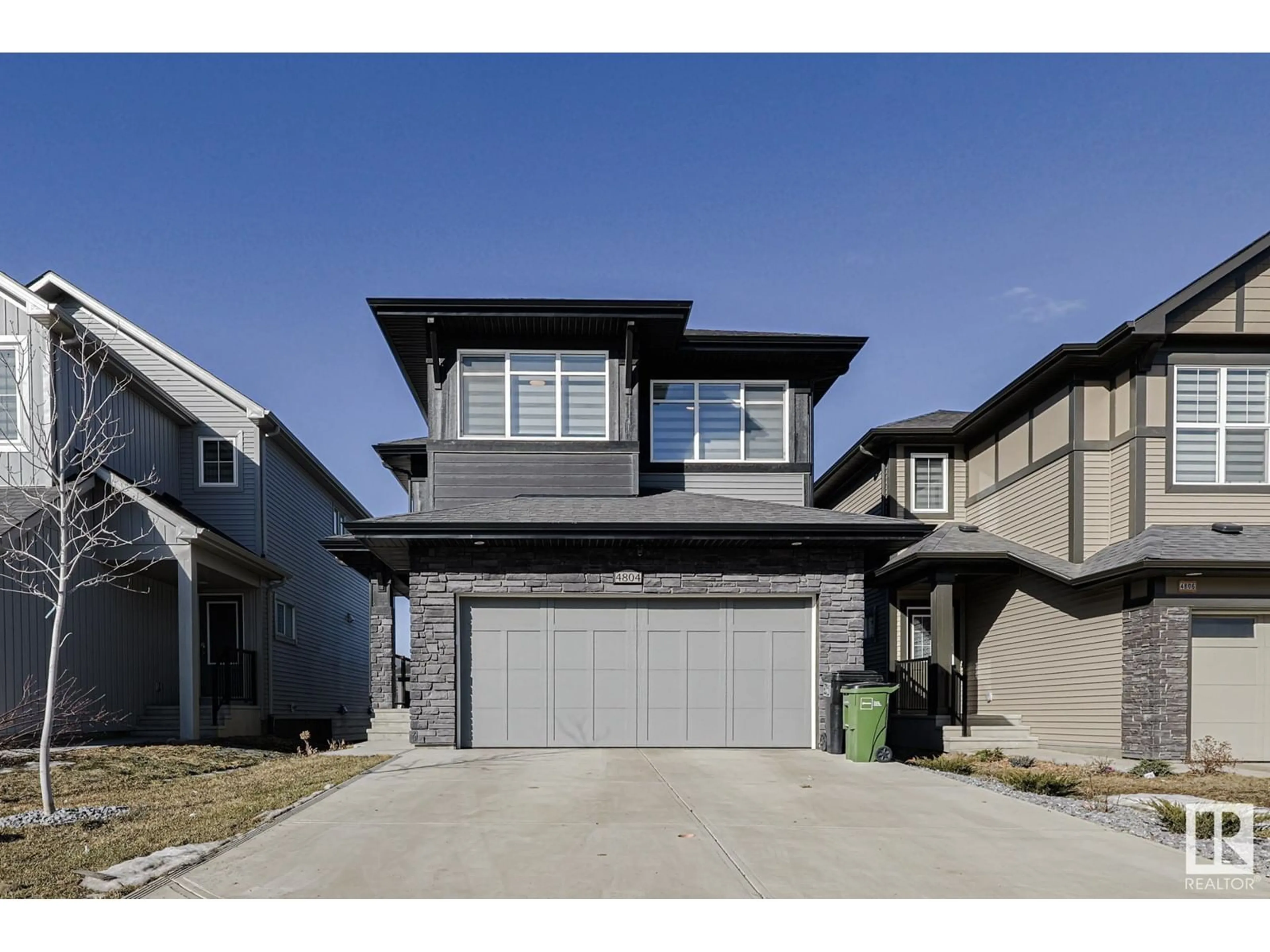 Home with vinyl exterior material, street for 4804 KINNEY RD, Edmonton Alberta T6W5G2
