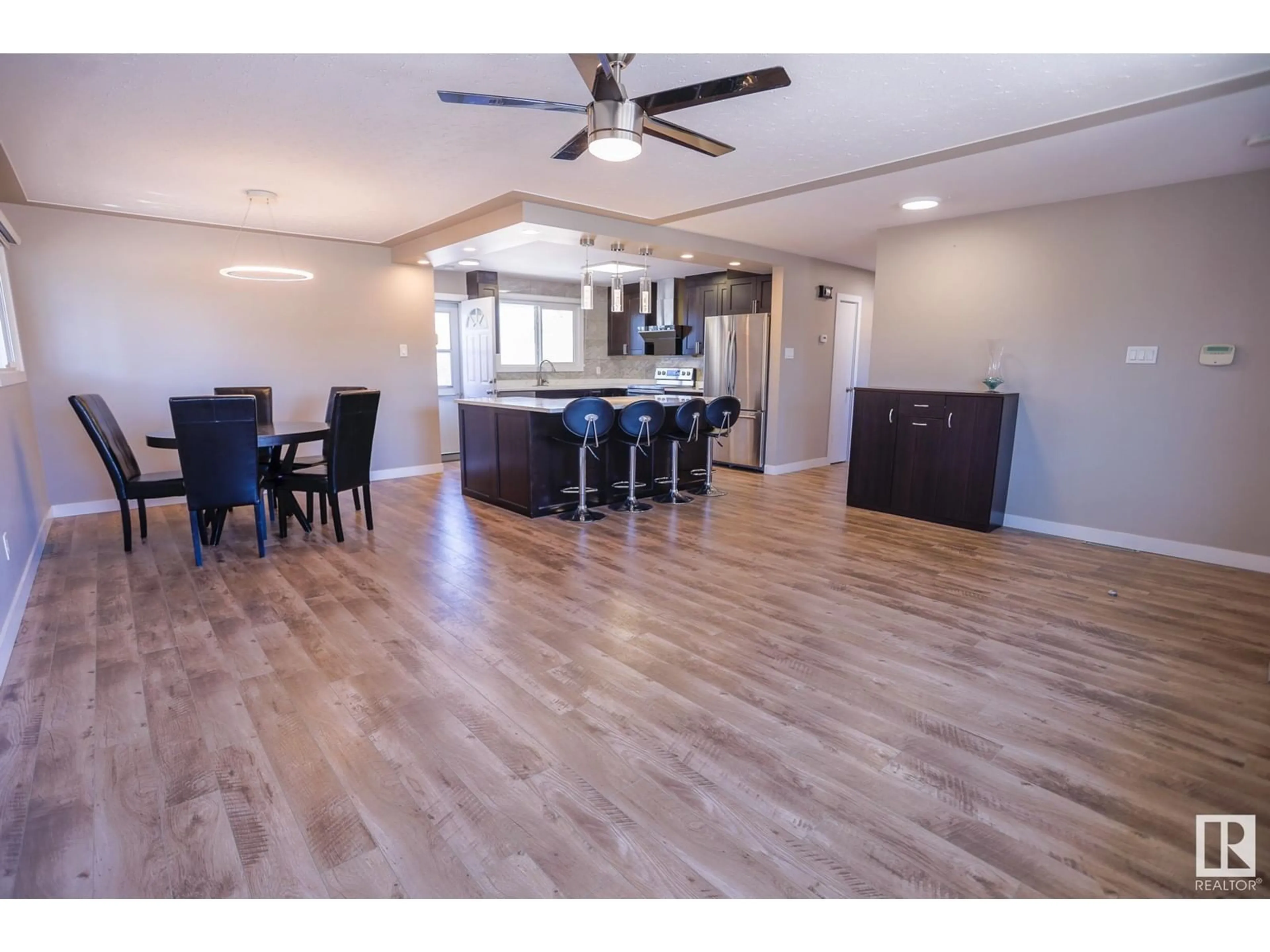 Open concept kitchen, wood/laminate floor for 8406 149 ST, Edmonton Alberta T5R1B4