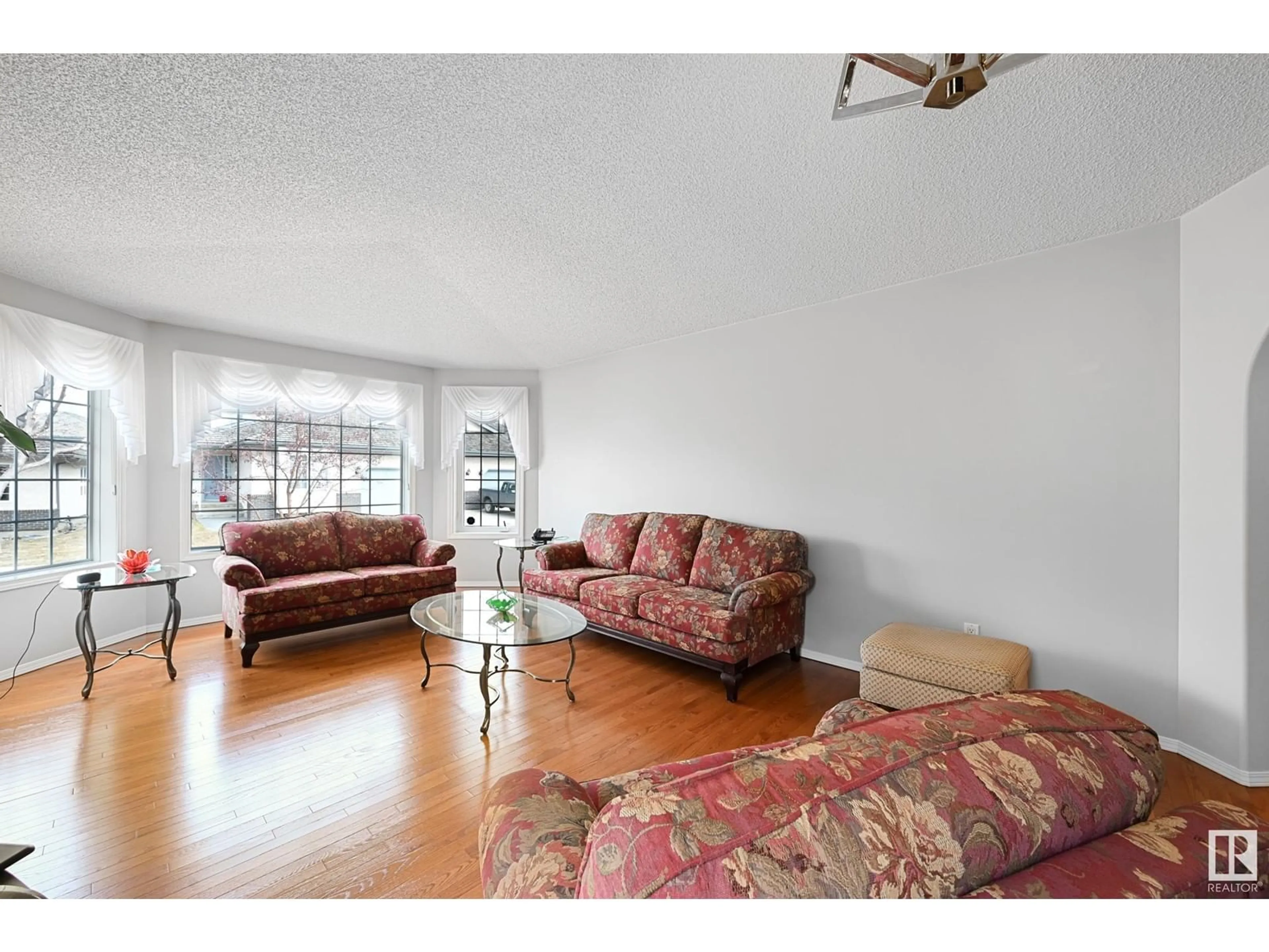 Living room with furniture, unknown for 215 - 128 BLACKBURN DR, Edmonton Alberta T6W1B9