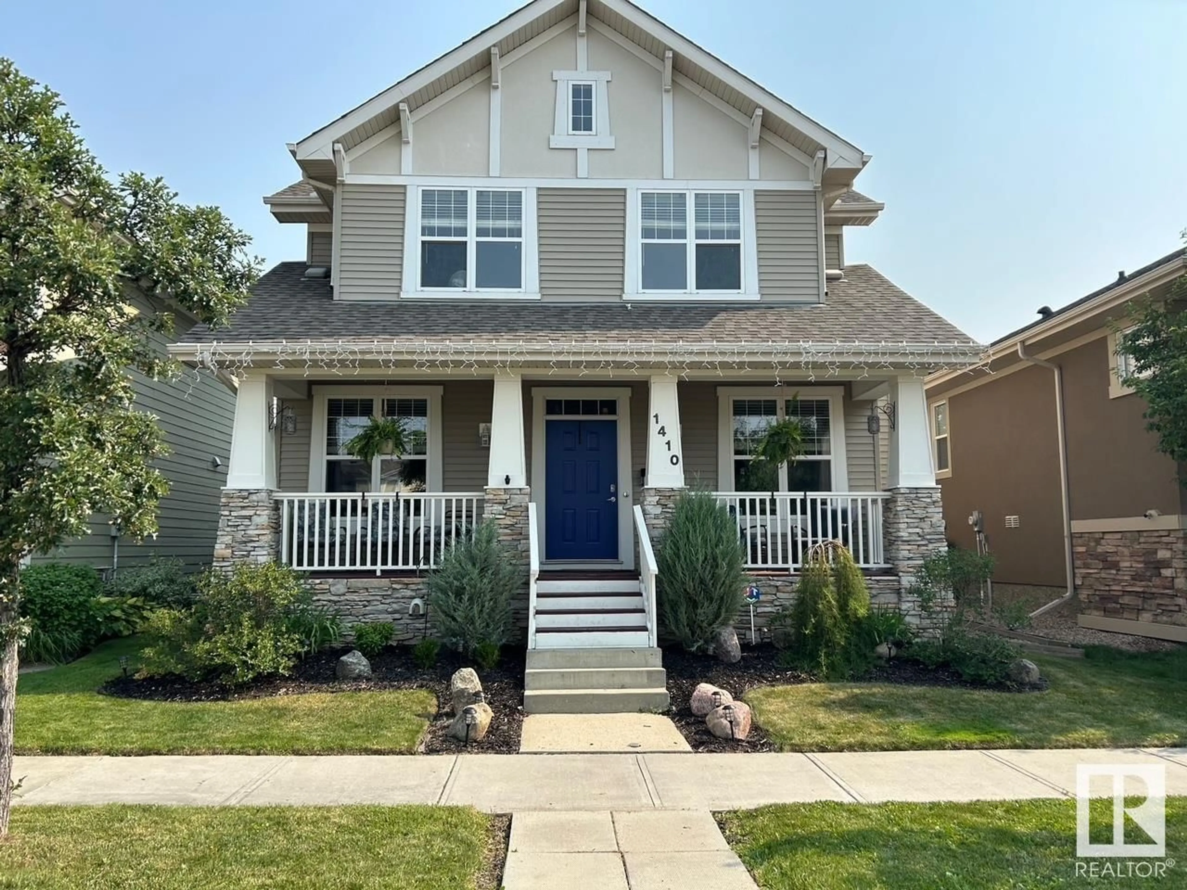 Home with vinyl exterior material, street for 1410 CYPRUS WY, Edmonton Alberta T5E6N2