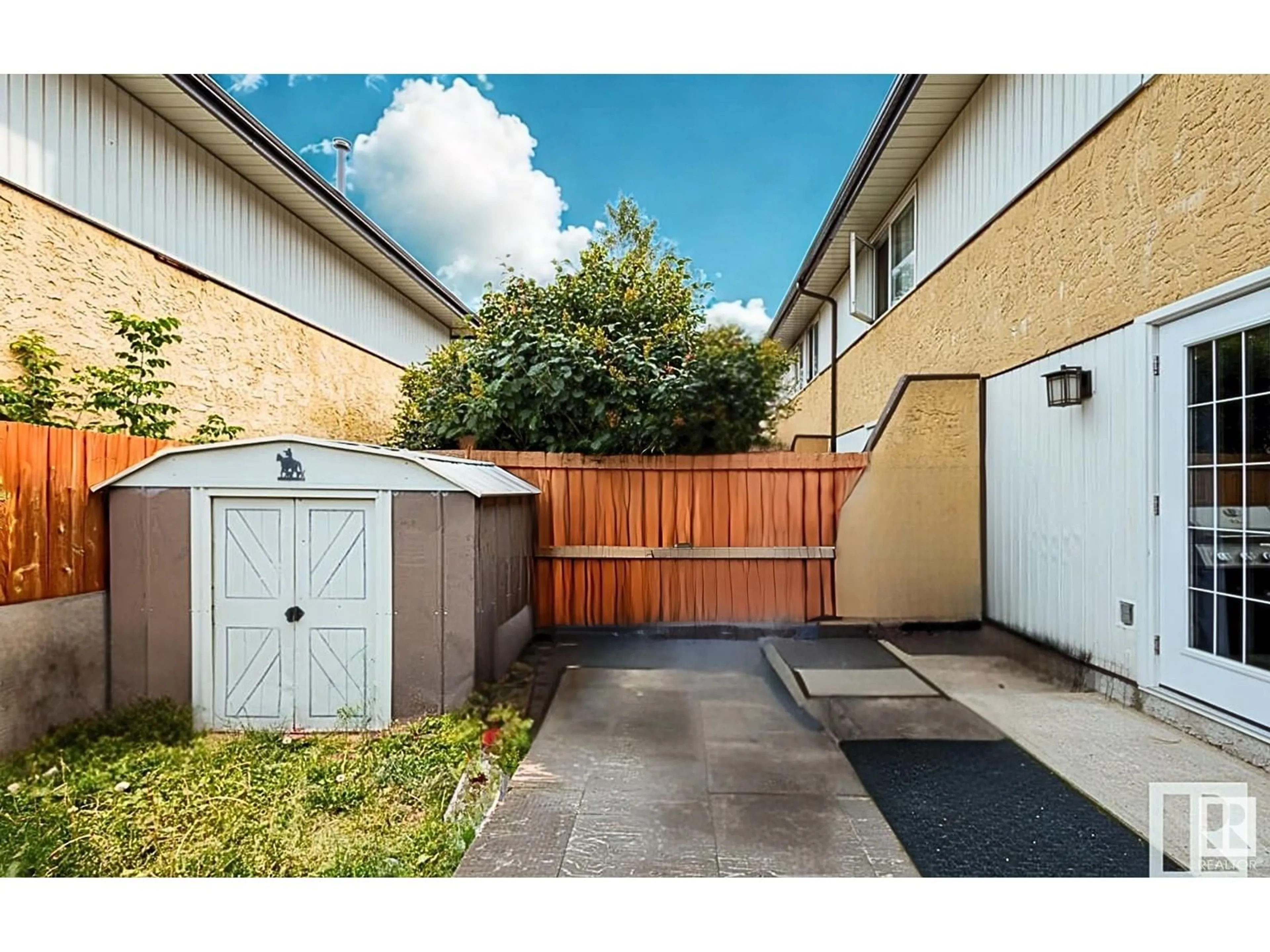 A pic from outside/outdoor area/front of a property/back of a property/a pic from drone, street for 3273 139 AV, Edmonton Alberta T5Y1T2