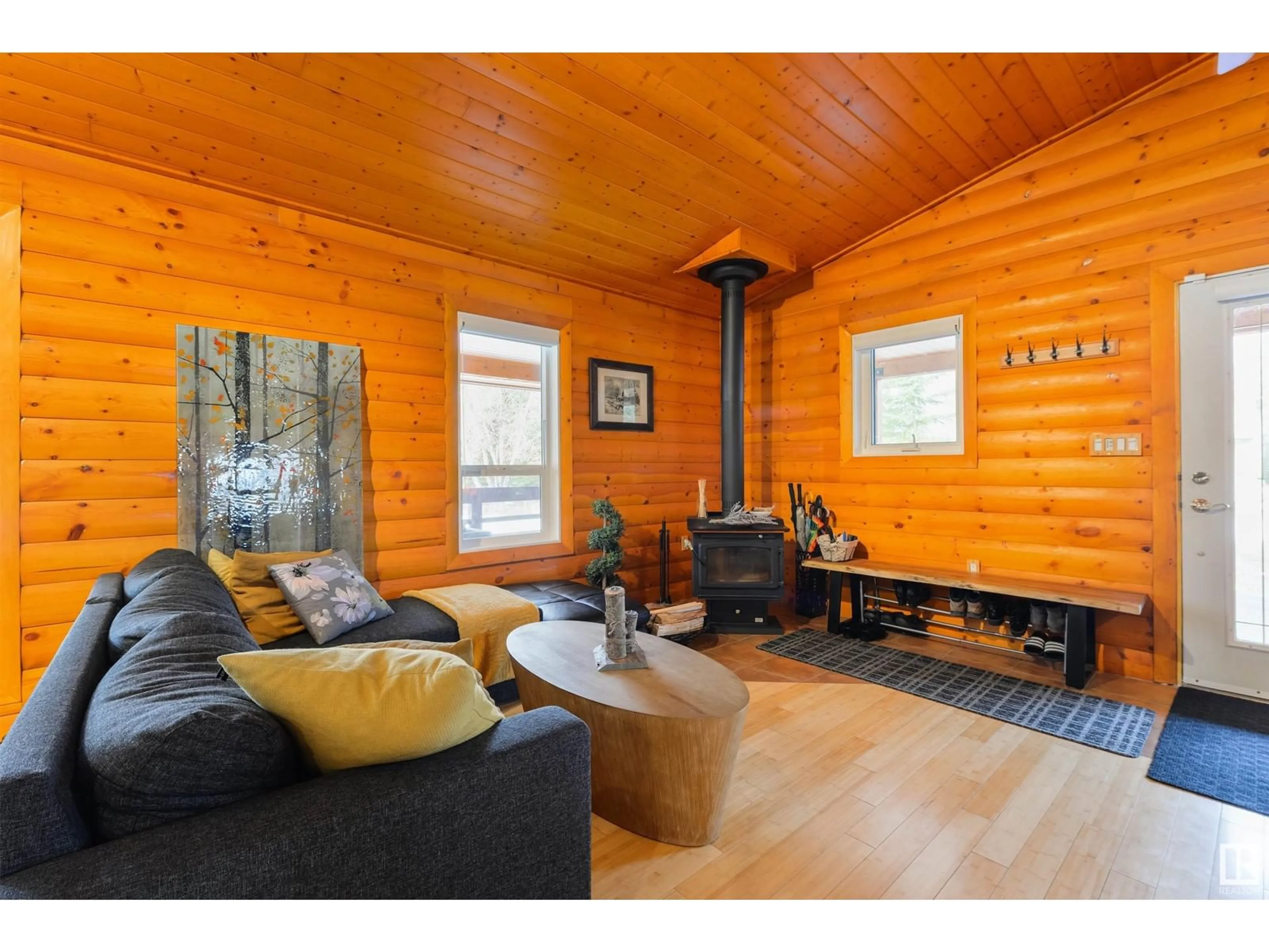 Living room with furniture, wood/laminate floor for 300 VALKING RD, Rural Lac Ste. Anne County Alberta T0E0A2
