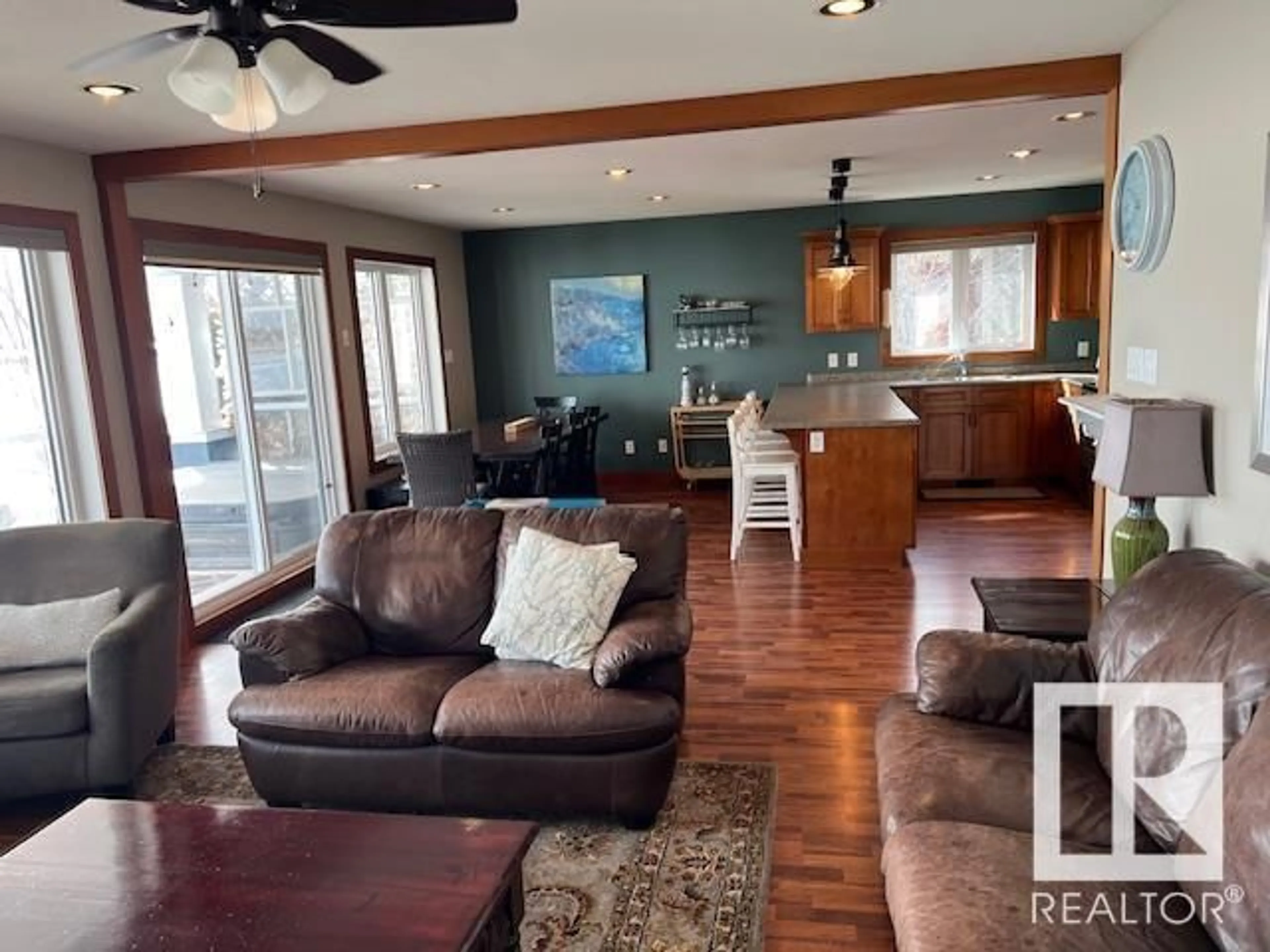 Living room with furniture, wood/laminate floor for 65 55101 STE. ANNE TR, Rural Lac Ste. Anne County Alberta T0E1A0