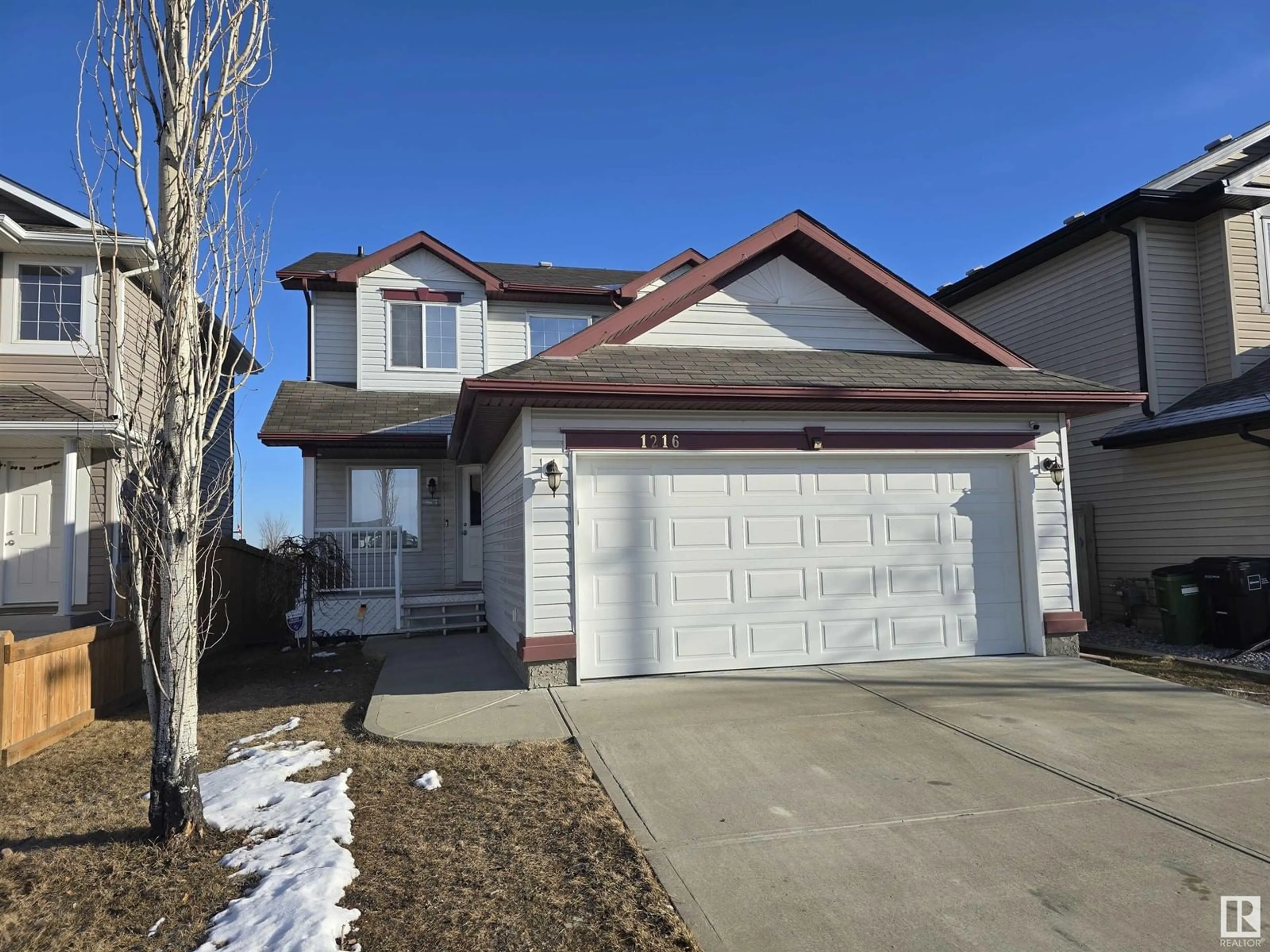 Home with vinyl exterior material, street for NW - 1216 37C AV, Edmonton Alberta T6T0E5