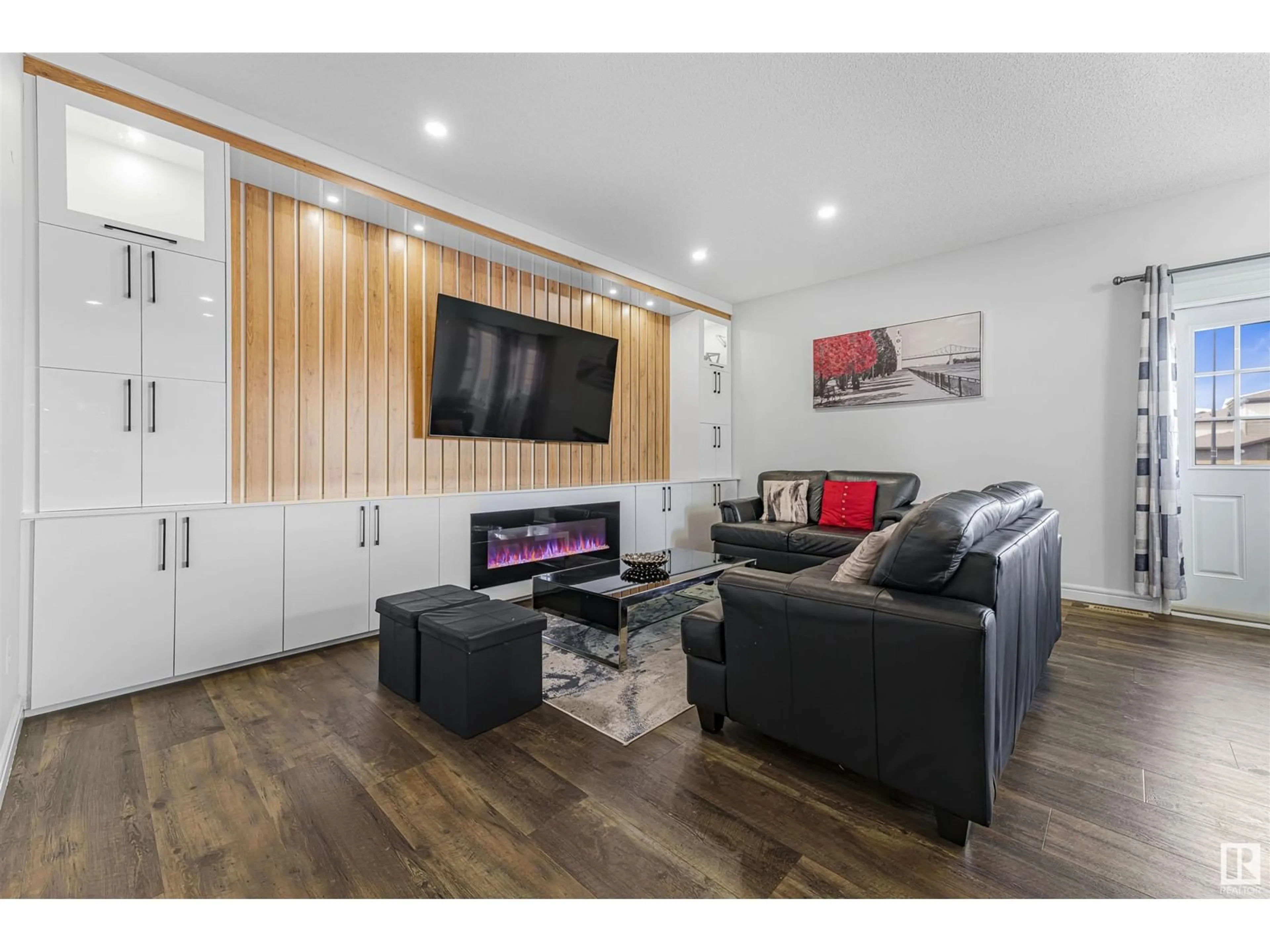 Living room with furniture, wood/laminate floor for 2218 CASEY CRES, Edmonton Alberta T6W3M6