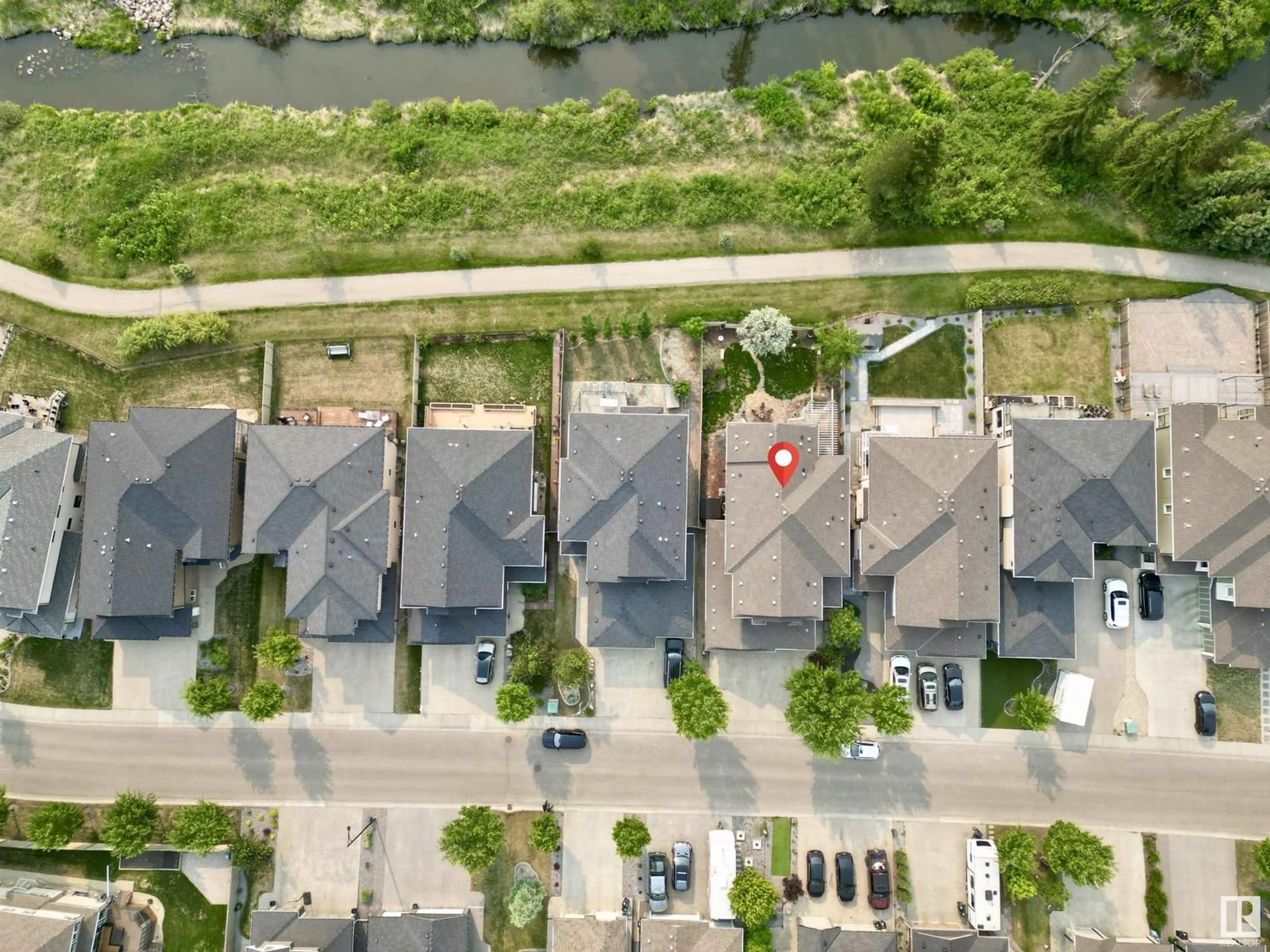 A pic from outside/outdoor area/front of a property/back of a property/a pic from drone, street for 1330 ADAMSON DR, Edmonton Alberta T6W2N8