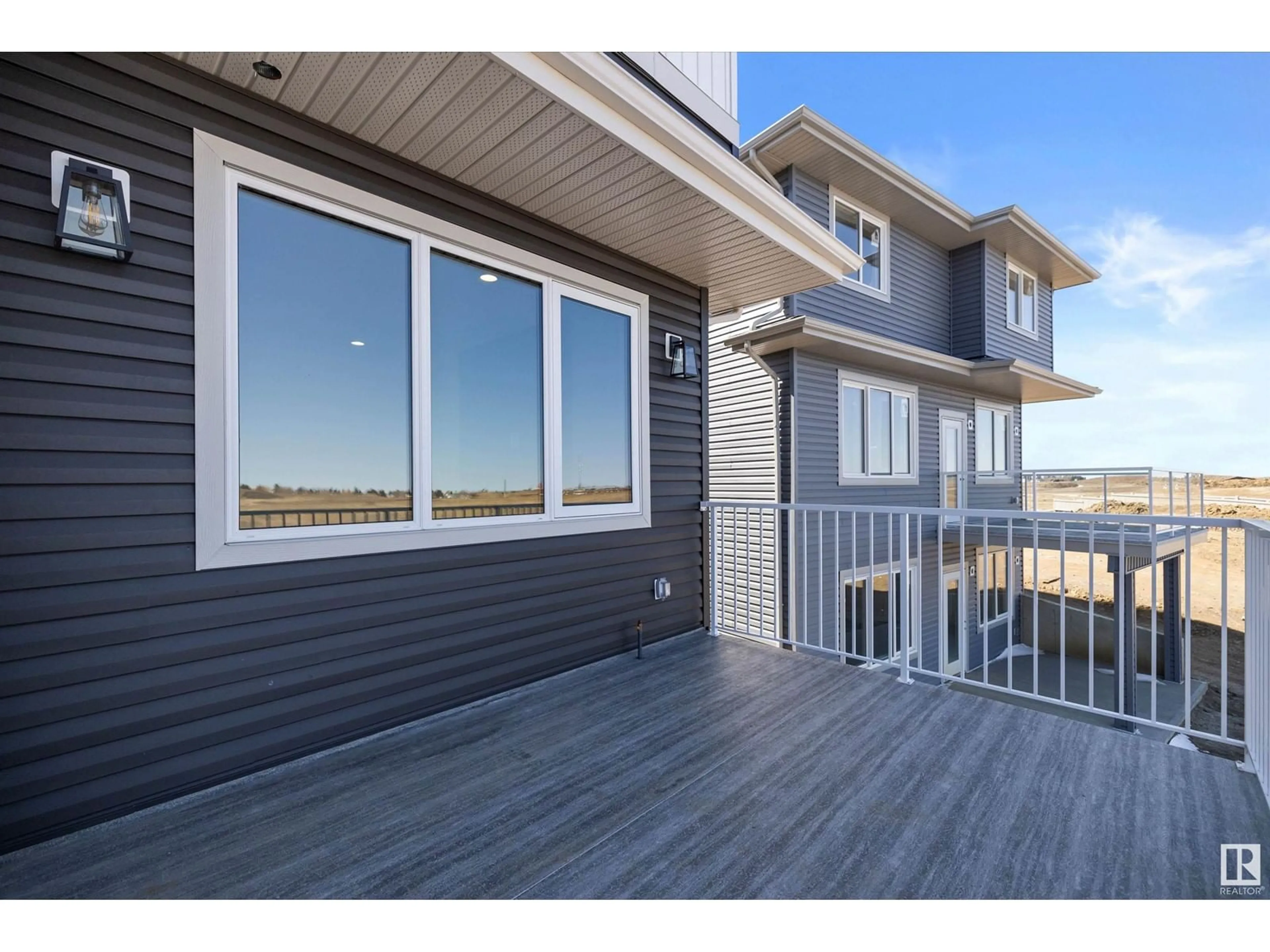 Home with vinyl exterior material, water/lake/river/ocean view for 10232 92A AV, Morinville Alberta T8R1P7