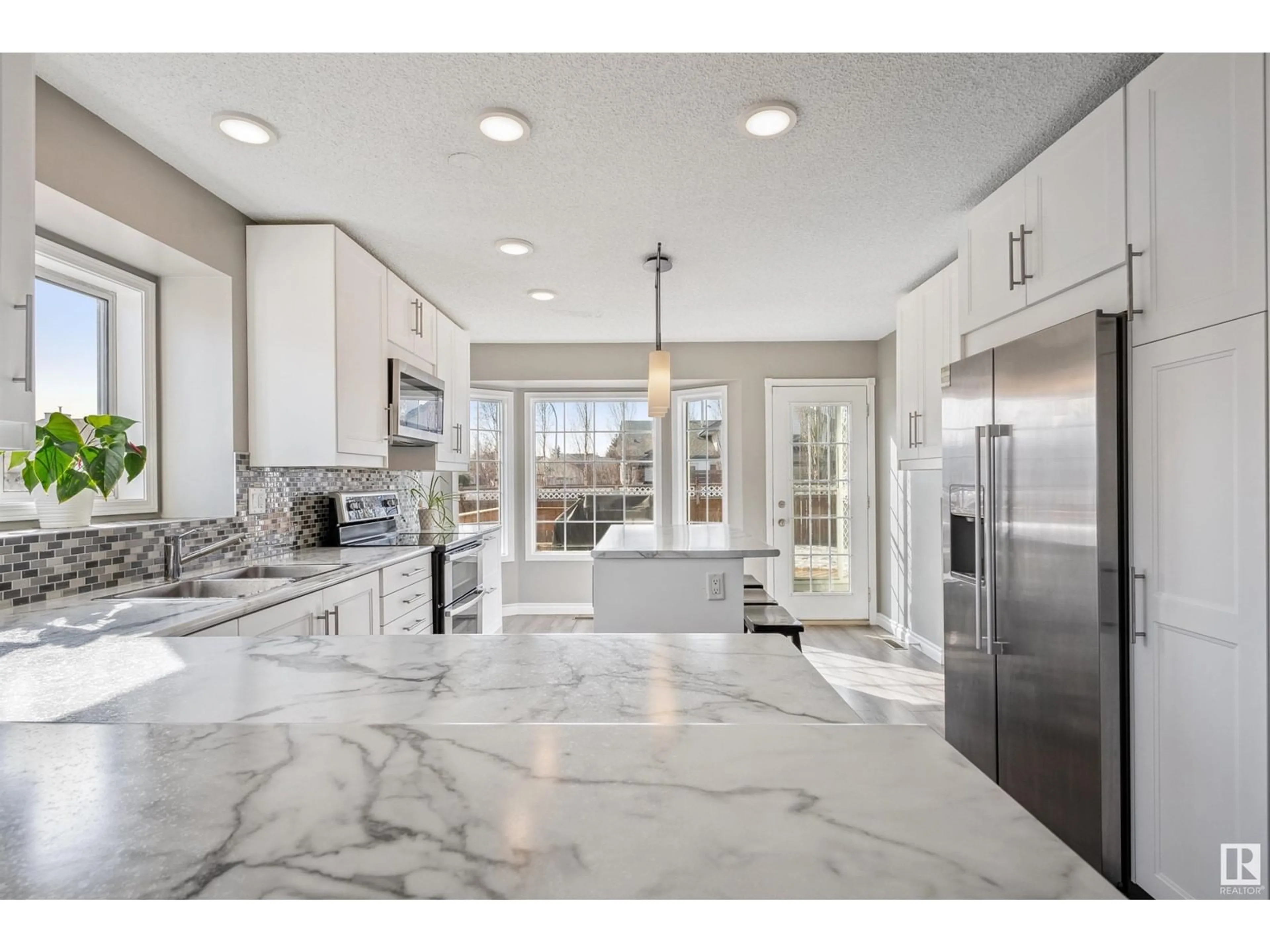Open concept kitchen, ceramic/tile floor for 3511 40 AV, Edmonton Alberta T6L6N8