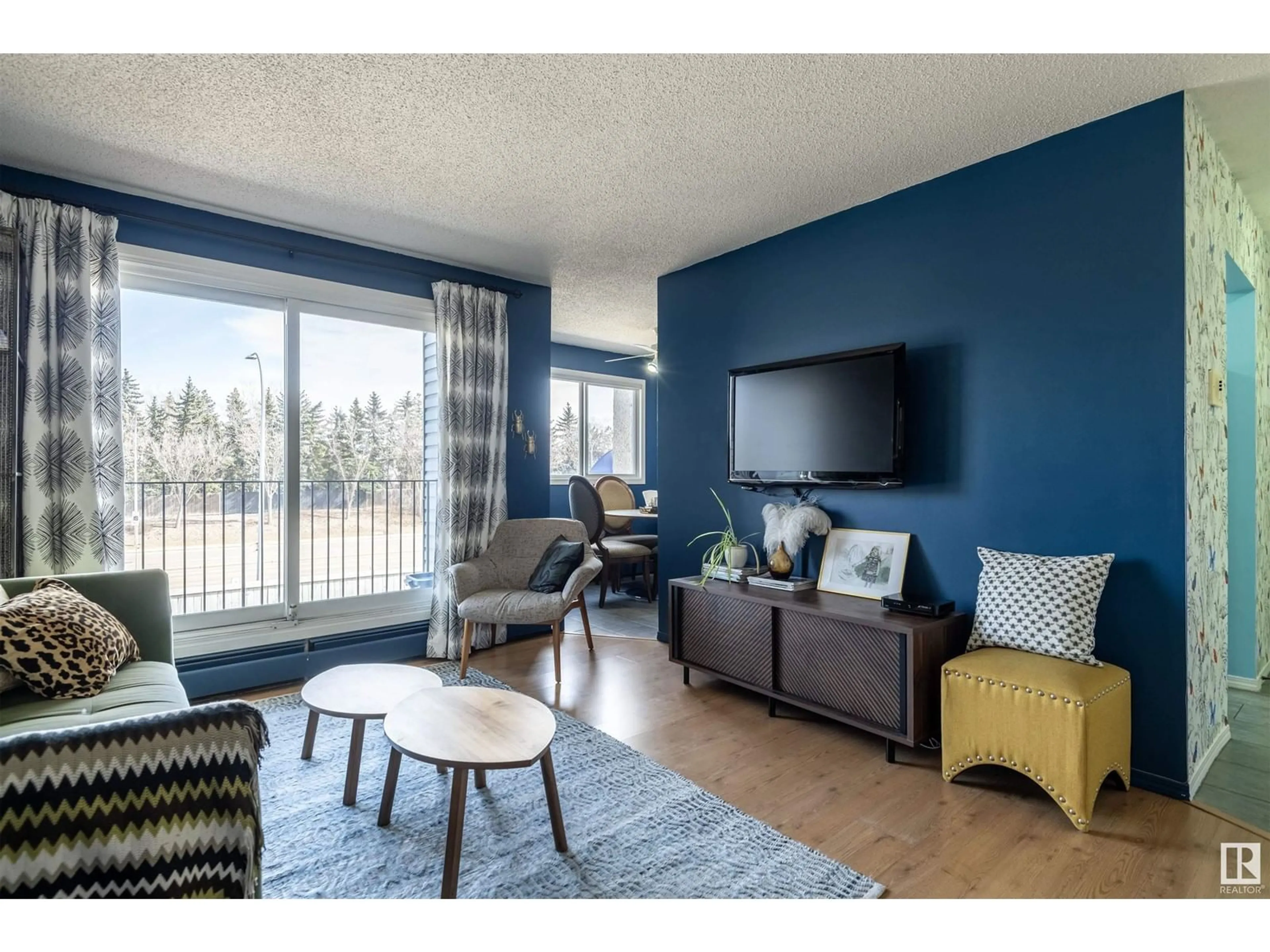 Living room with furniture, wood/laminate floor for #202 - 7203 171 ST, Edmonton Alberta T5T2R1