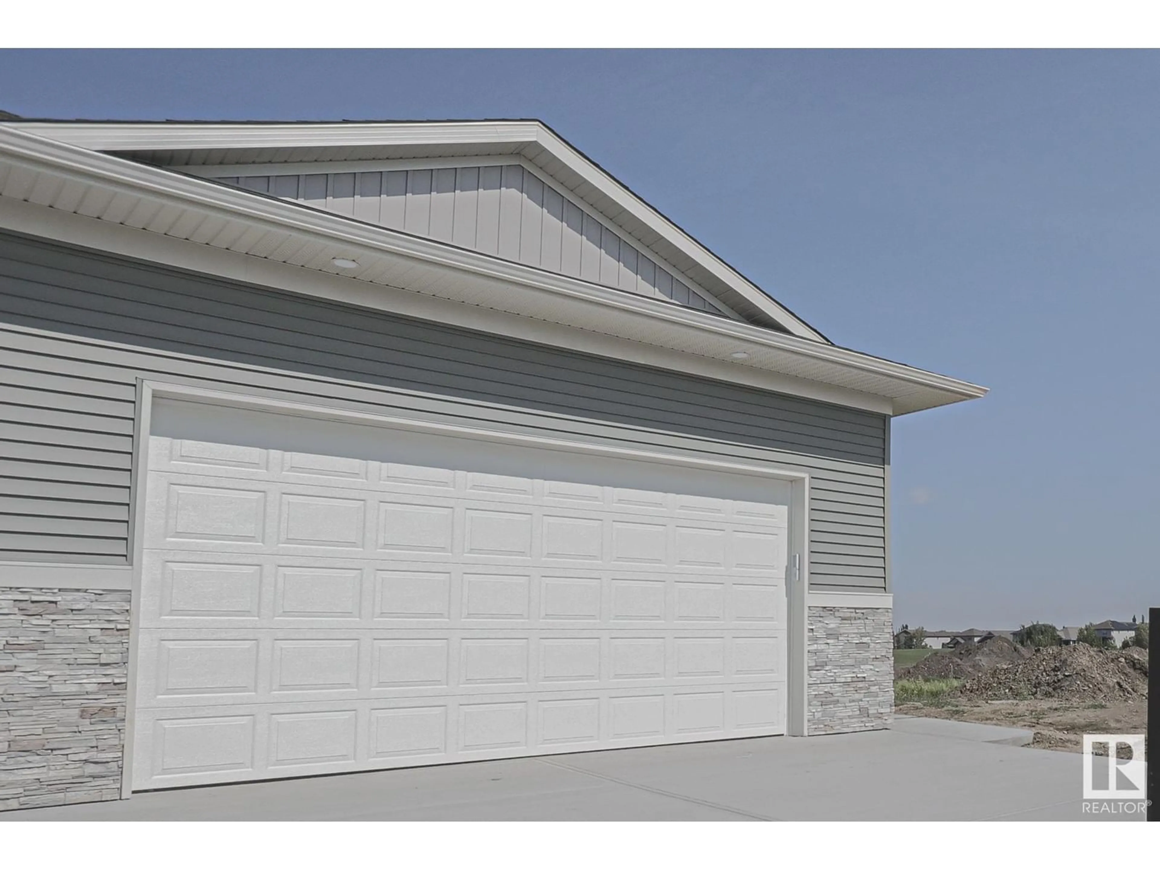 Home with vinyl exterior material, street for 11 - 26 DALTON LI, Spruce Grove Alberta T7X2X8