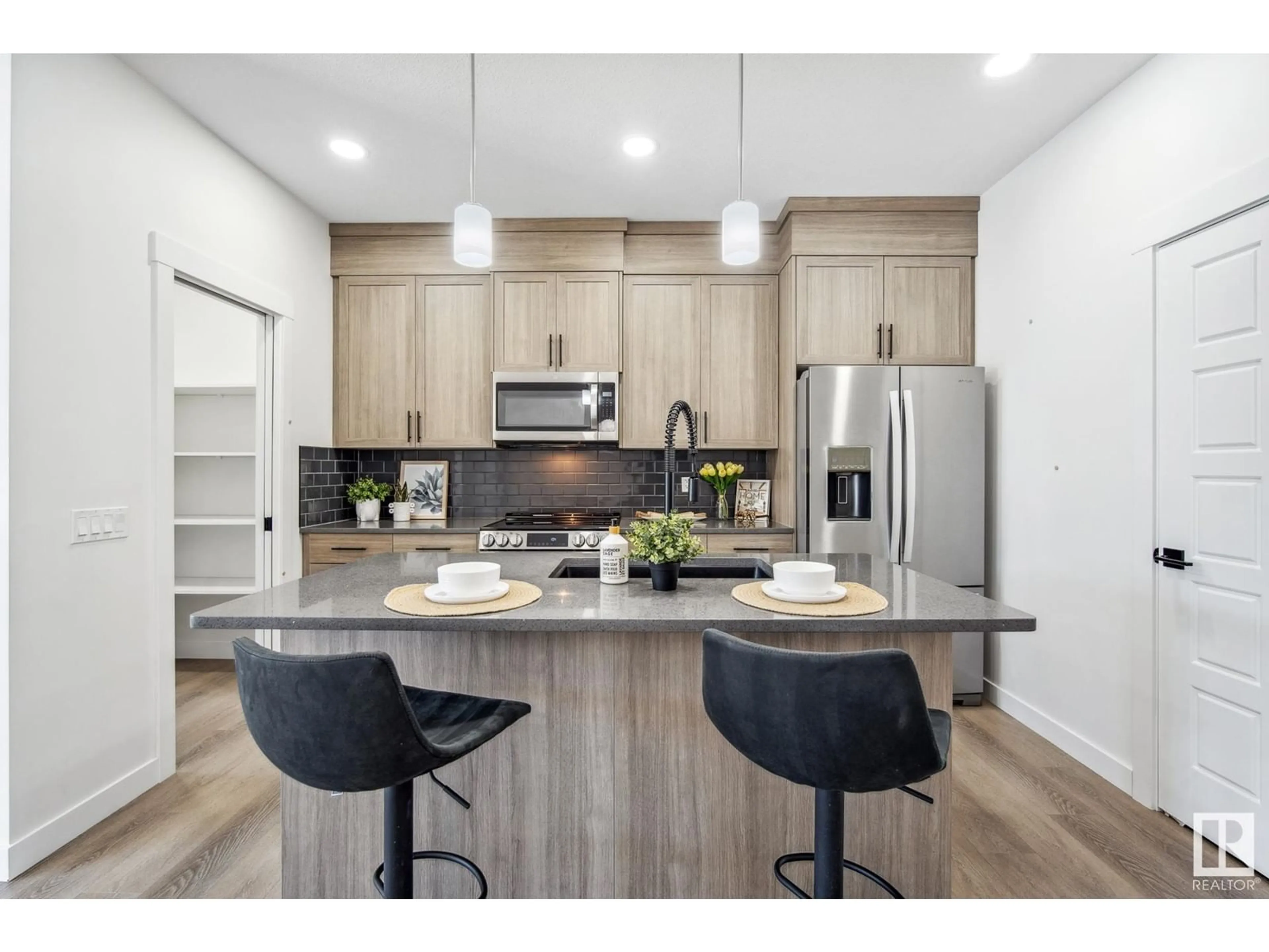 Open concept kitchen, wood/laminate floor for 448 EDGEMONT DR, Edmonton Alberta T6M1S1