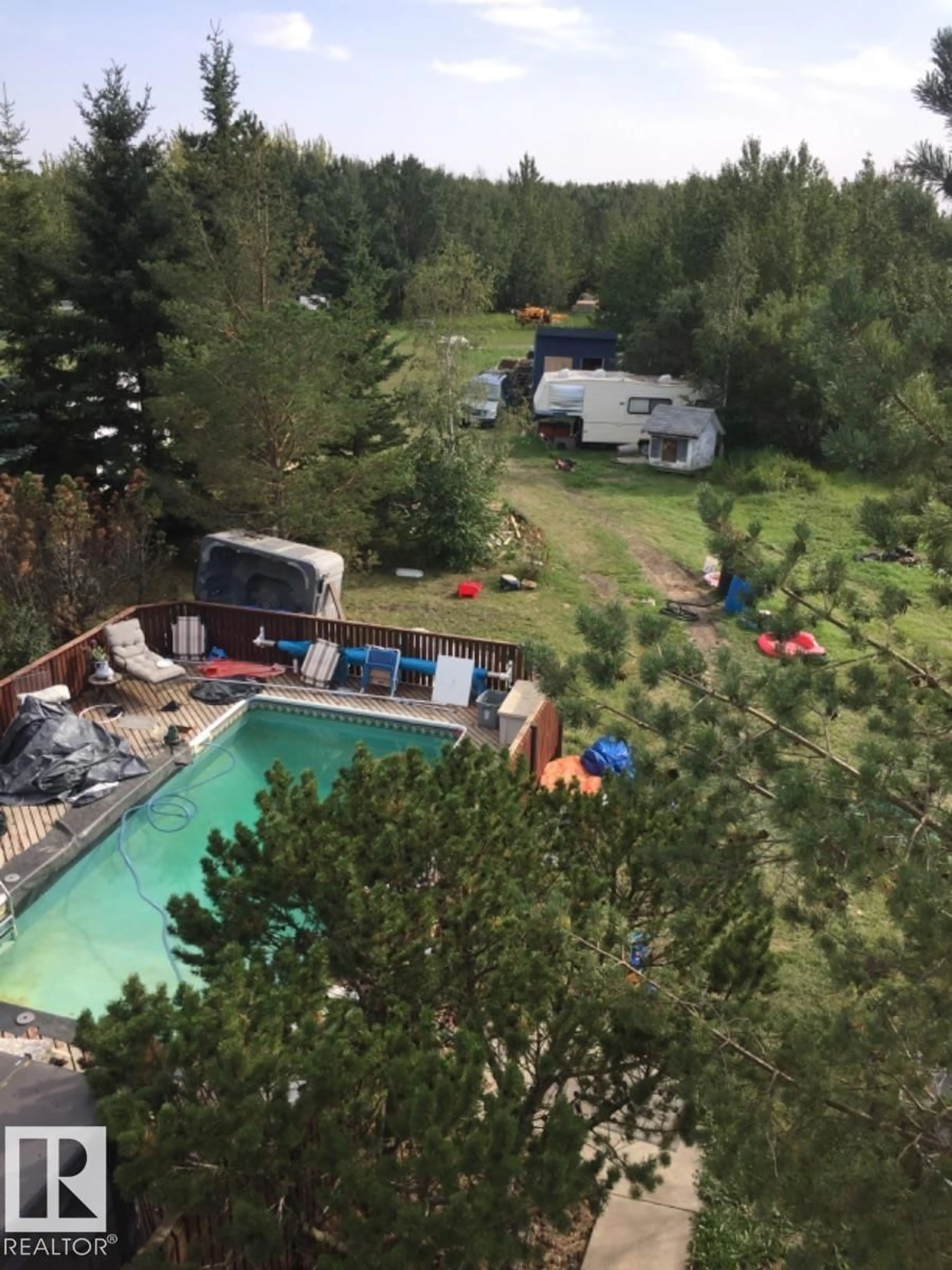 A pic from outside/outdoor area/front of a property/back of a property/a pic from drone, forest/trees view for 25103 TWP ROAD 552, Rural Sturgeon County Alberta T8R2C3