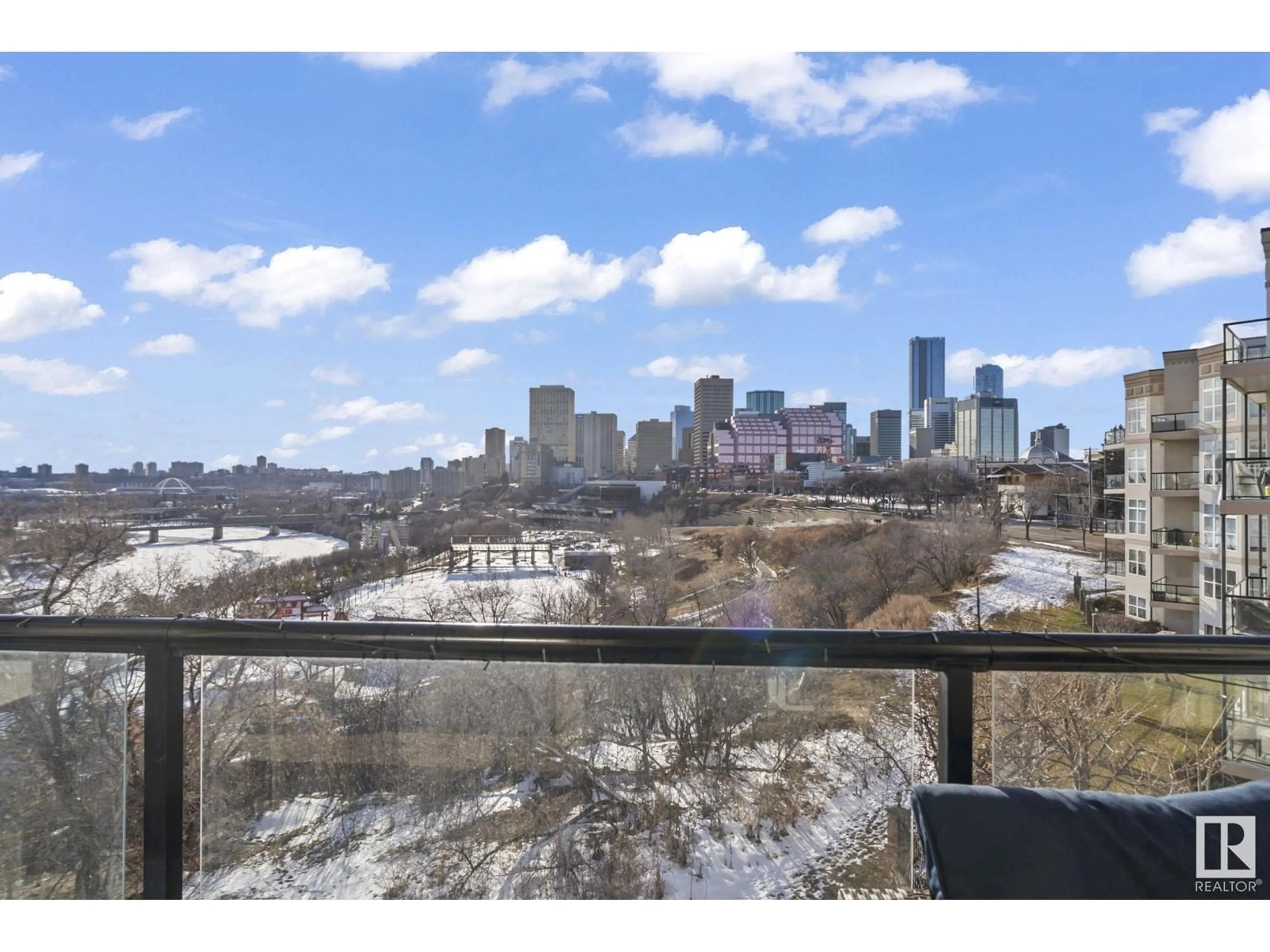 Patio, city buildings view from balcony for 411 - 9503 101 AV, Edmonton Alberta T5H4R1