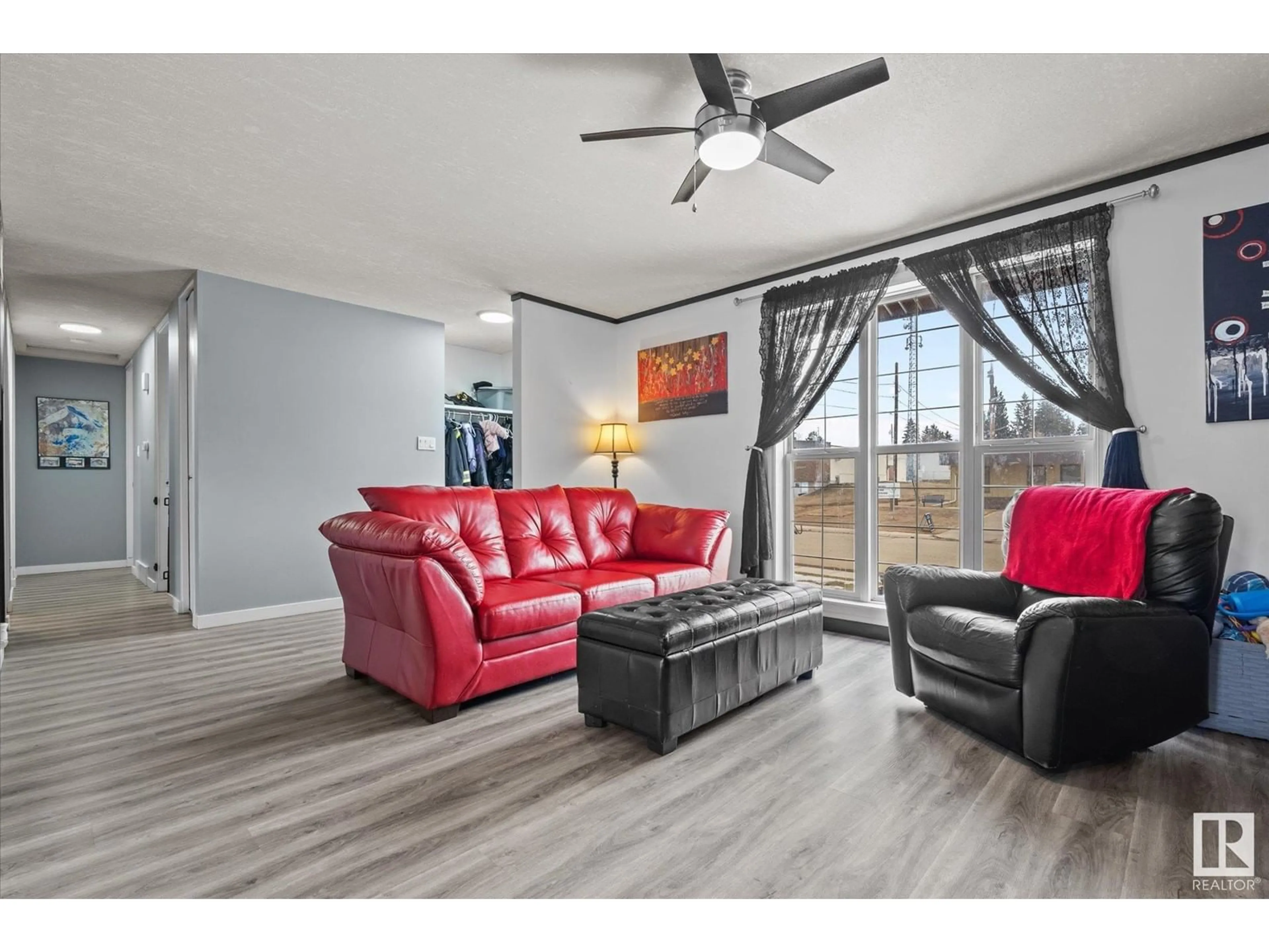 Living room with furniture, wood/laminate floor for 5129 53 AV, Wabamun Alberta T0E2K0