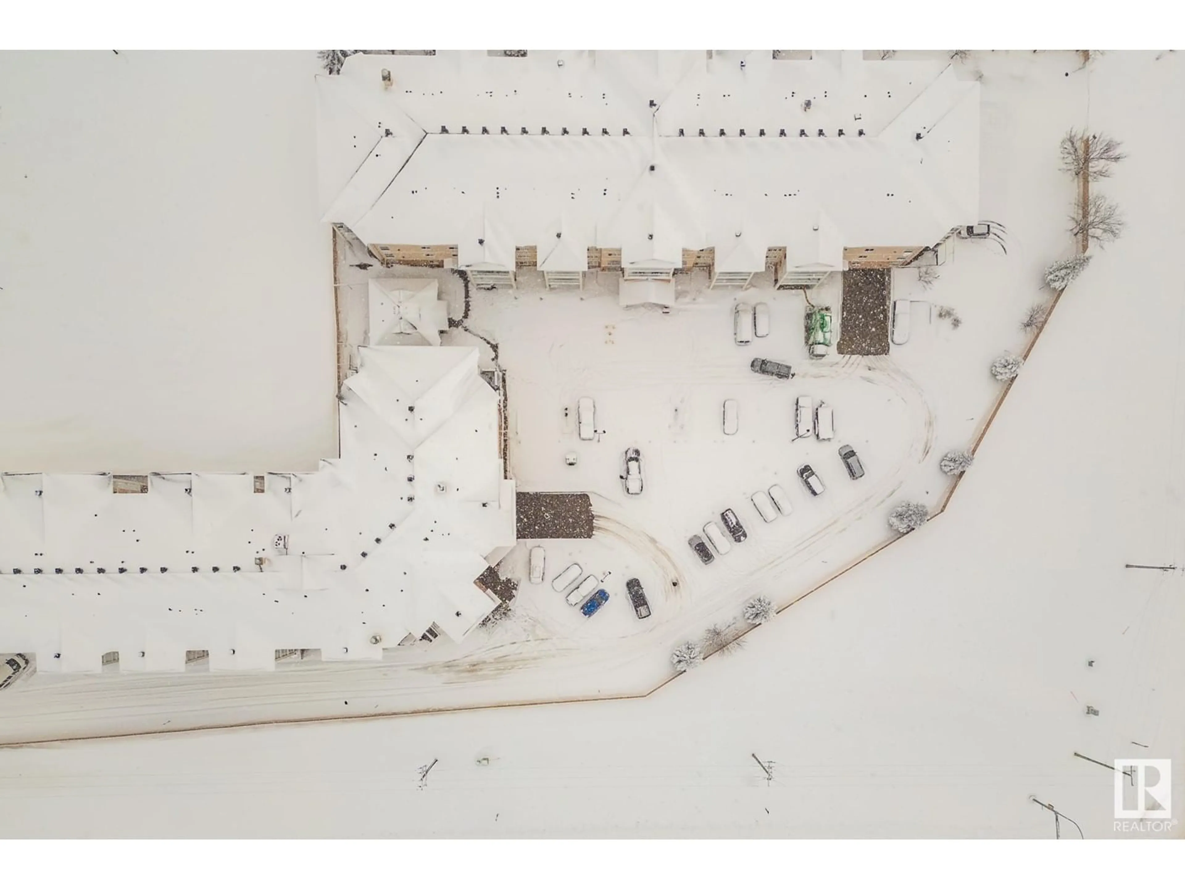 A pic from outside/outdoor area/front of a property/back of a property/a pic from drone, building for 423 7801 GOLF COURSE RD, Stony Plain Alberta T7Z0C7