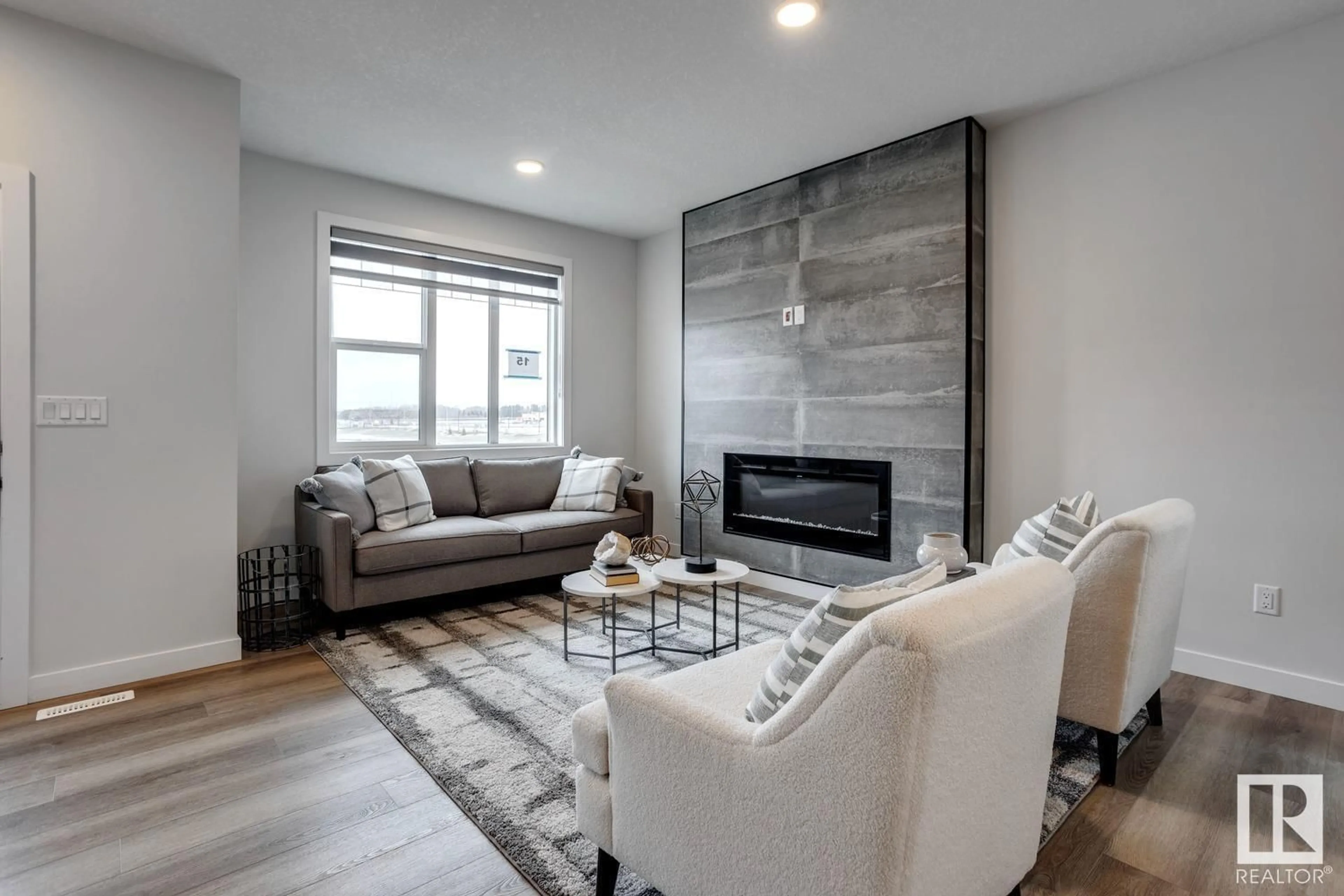 Living room with furniture, unknown for 23 SERENO LN, Fort Saskatchewan Alberta T8L0Z9