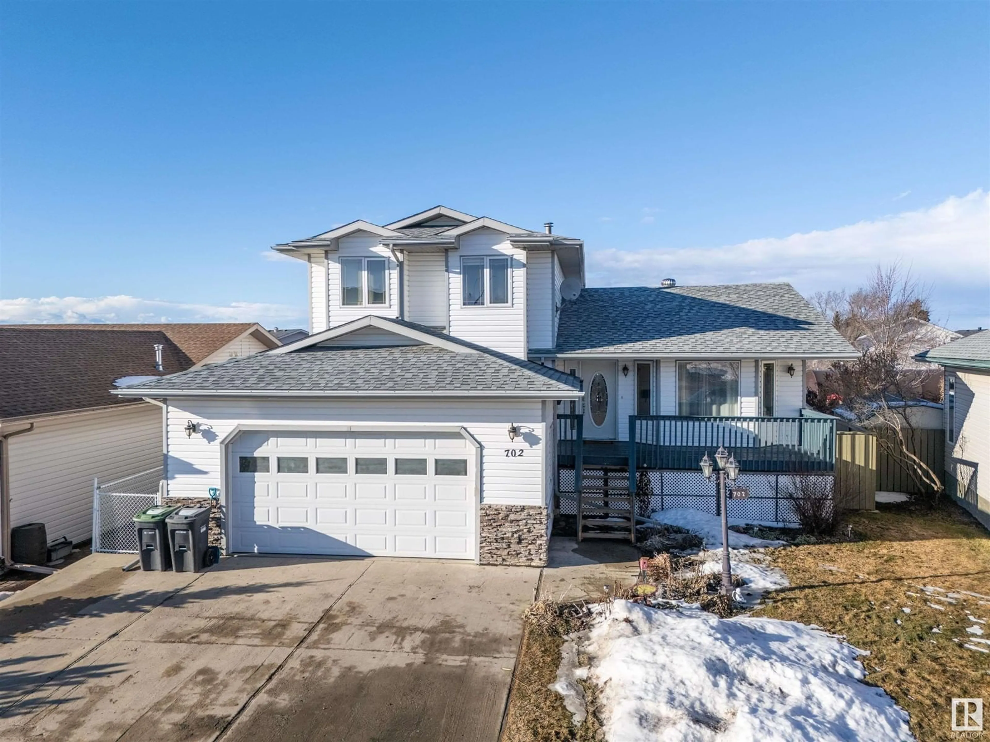 Home with vinyl exterior material, street for 702 20 AV, Cold Lake Alberta T9M1K3